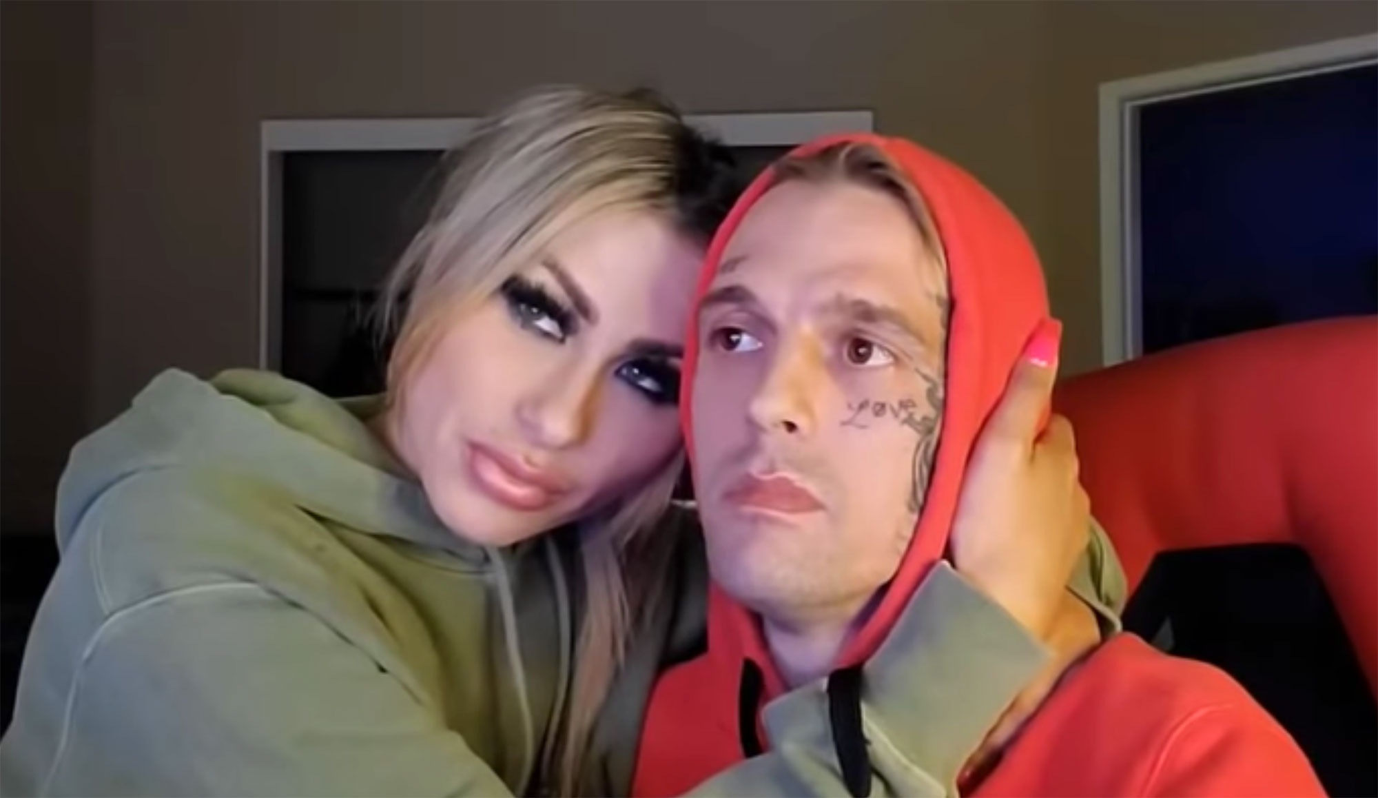 Aaron Carter Reveals On-Off Girlfriend Melanie Martin Suffered a Miscarriage Red Hoodie