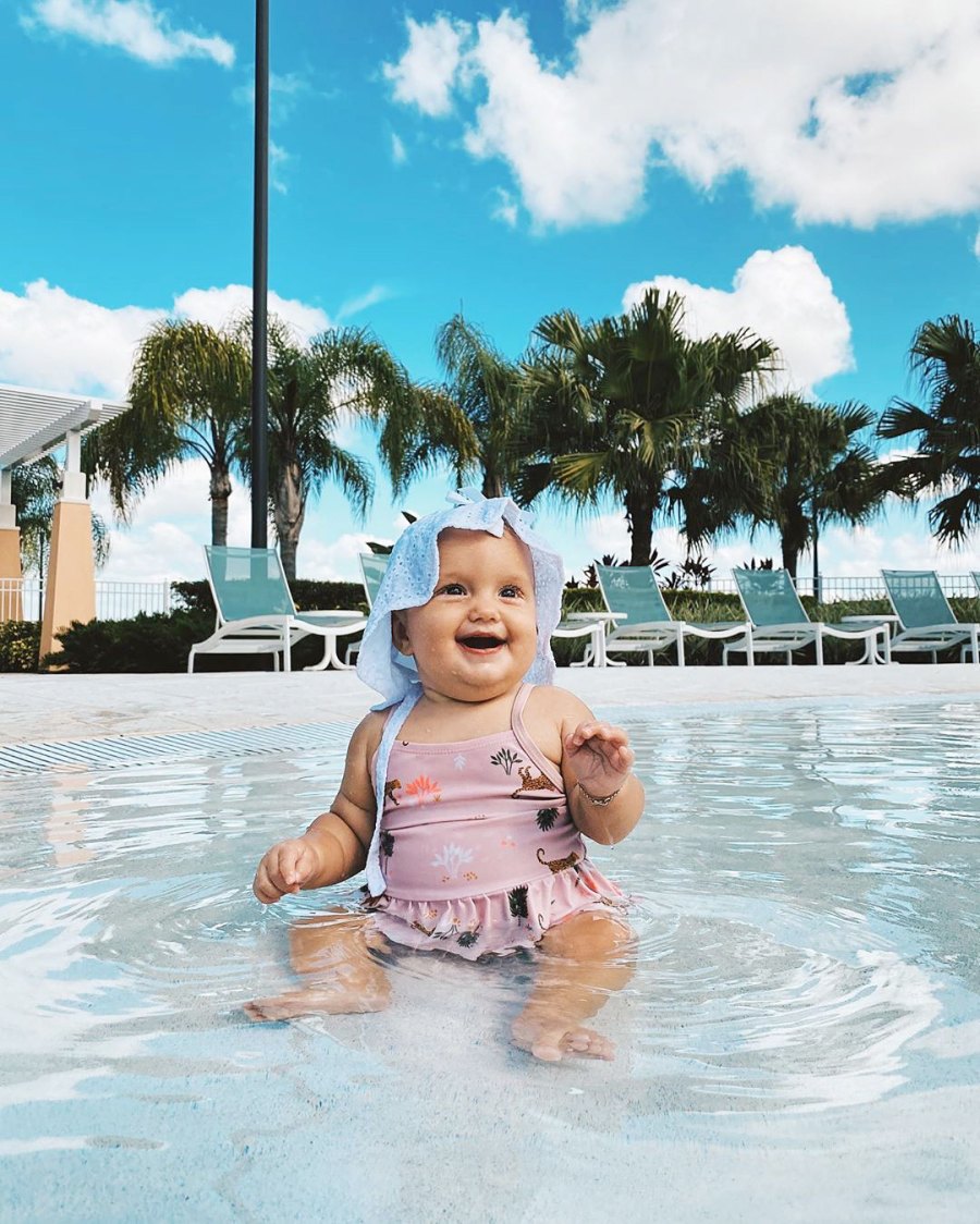 Carlin Bates Daugher Layla Smiling In A Swimming Pool