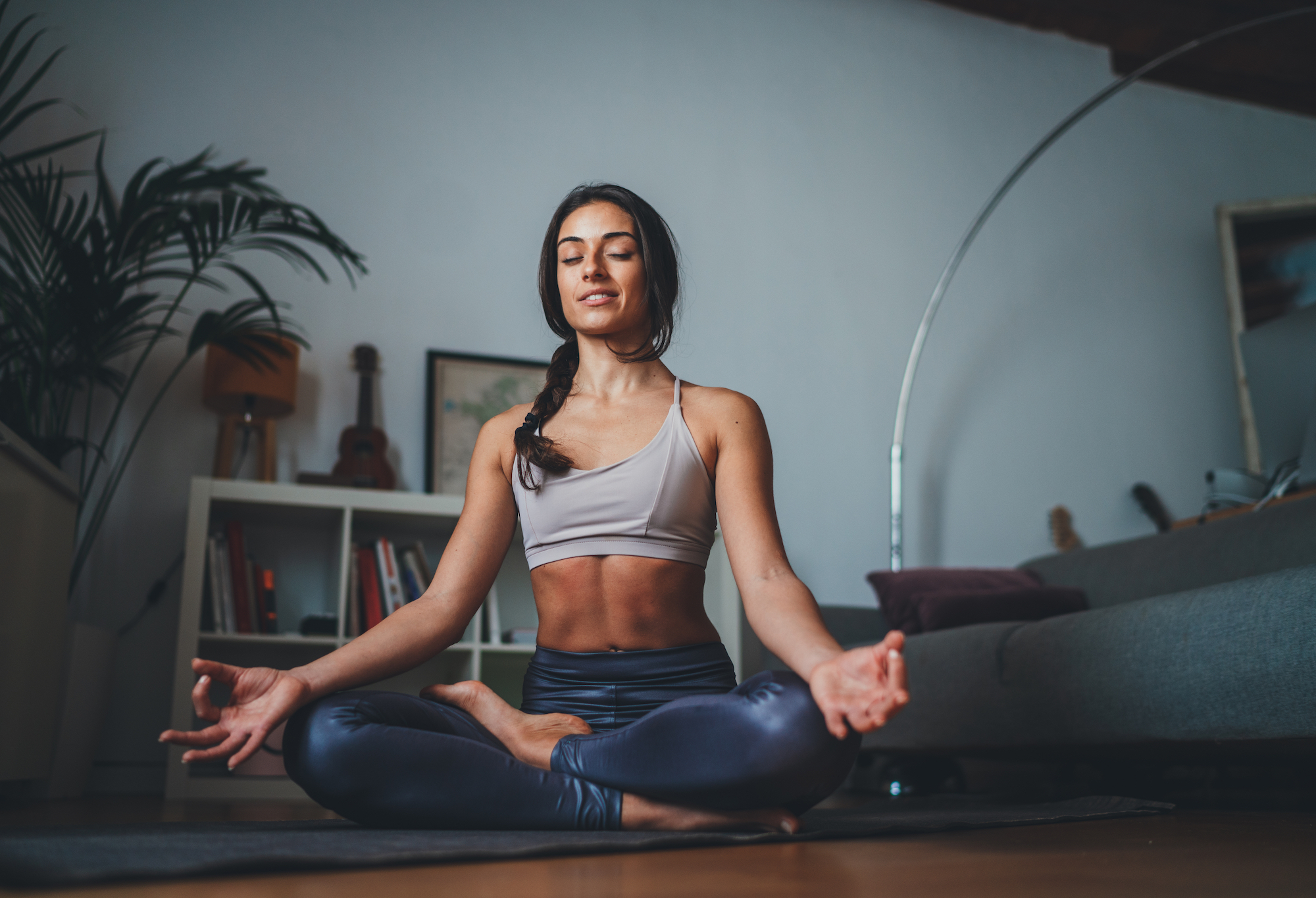 Woman-Working-Out-Yoga-Stock-Photo