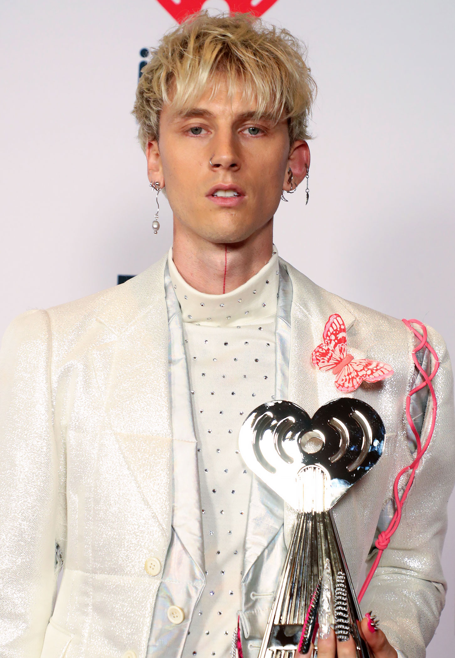 Did Machine Gun Kelly Get Extensions?
