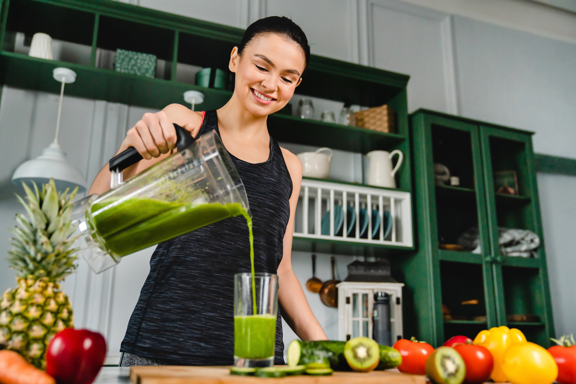 Woman-Using-Blender-Stock-Photo