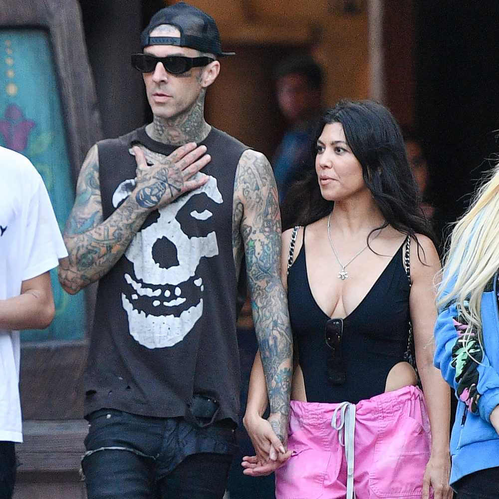 Packing on the PDA! Kourtney Kardashian and Travis Barker Share Steamy Makeout at UFC 264 Match