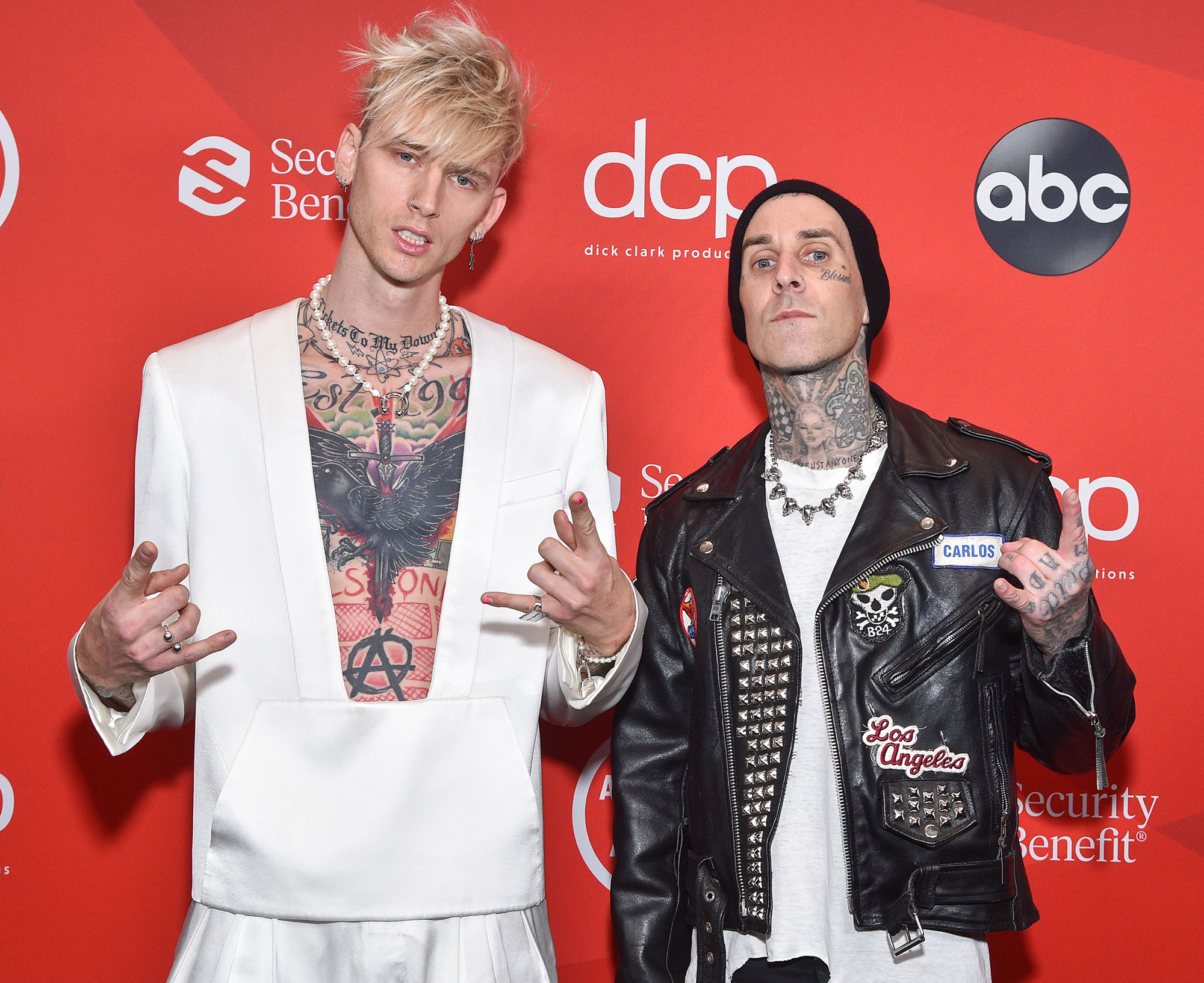 Travis Barker Machine Gun Kelly Get Matching Tattoos Born With Horns Album