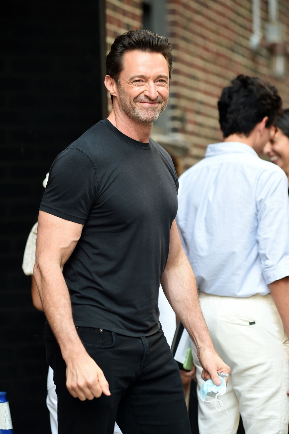 Hugh Jackman walks in New York City.