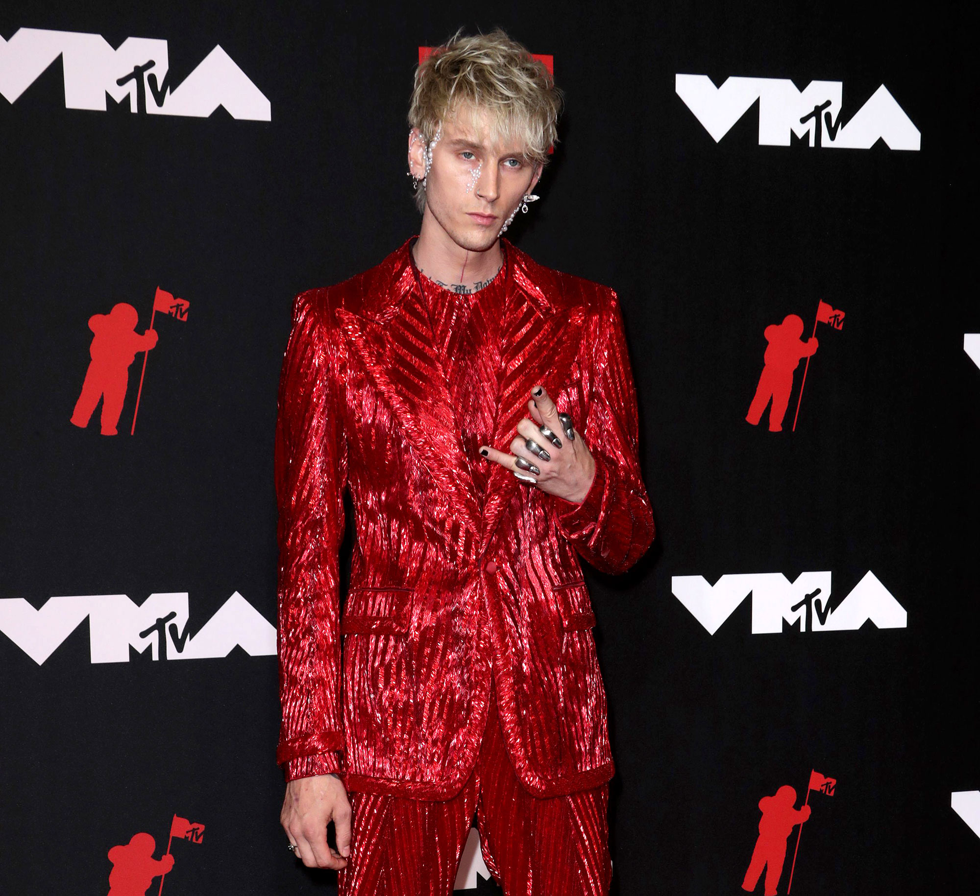Machine Gun Kelly Launches UN/DN LAQR Nail Polish