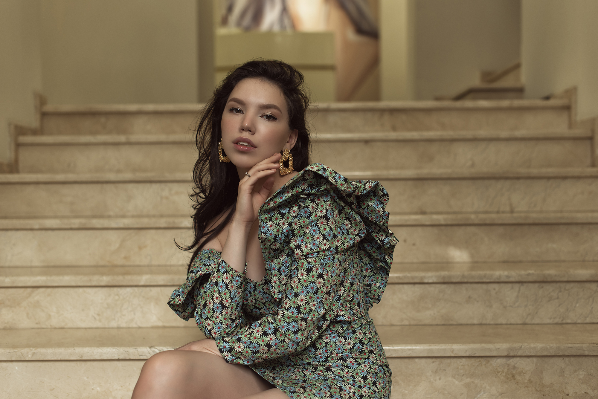 Young woman walking in summer city