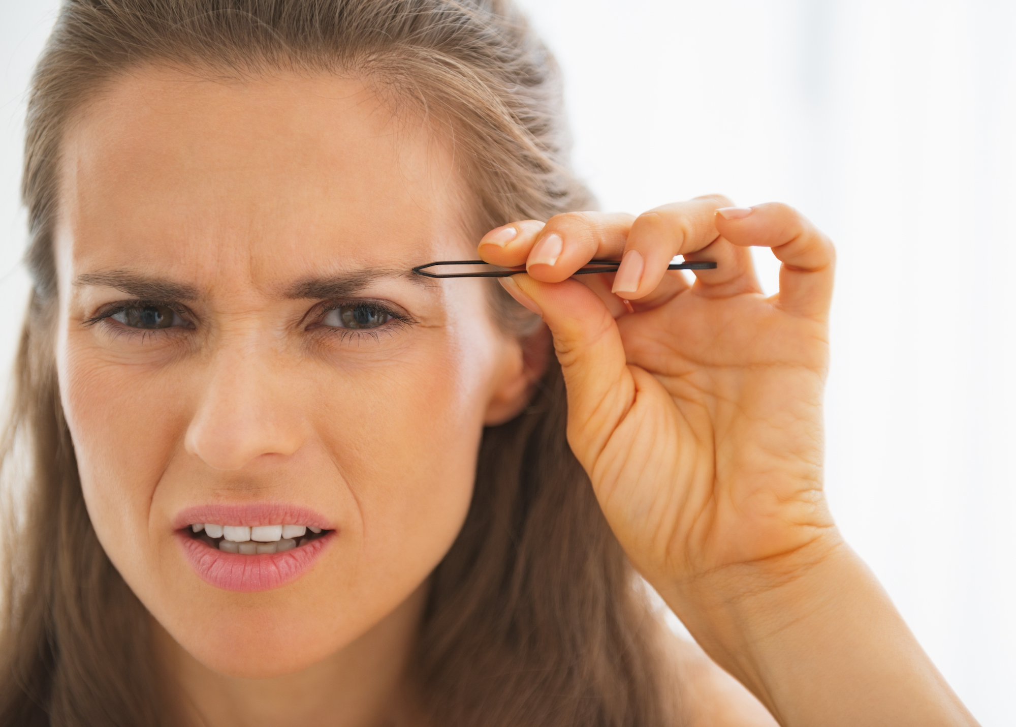 Overplucked-Brows-Stock-Photo