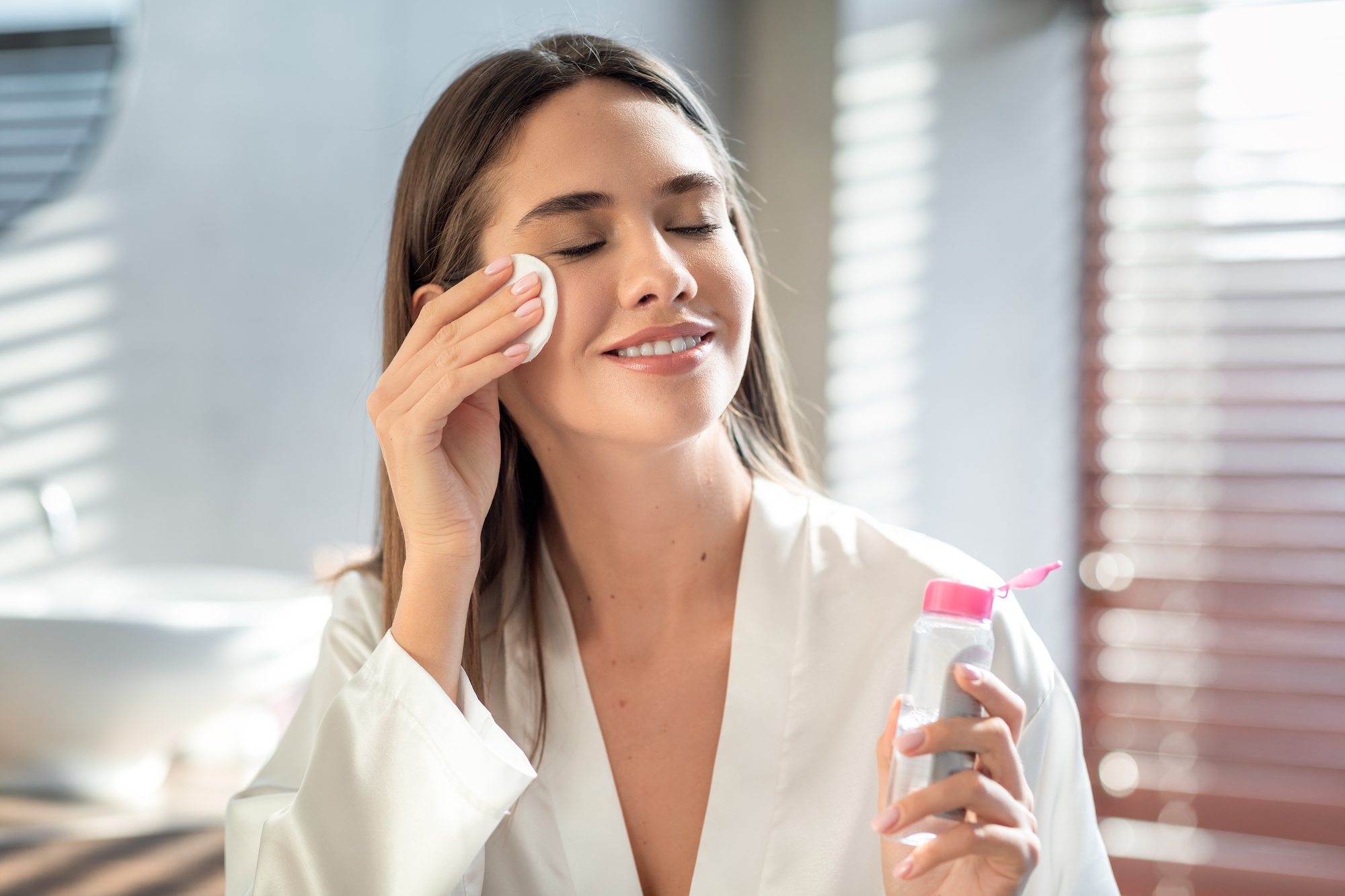 Woman-Removing-Makeup-Stock-Photo