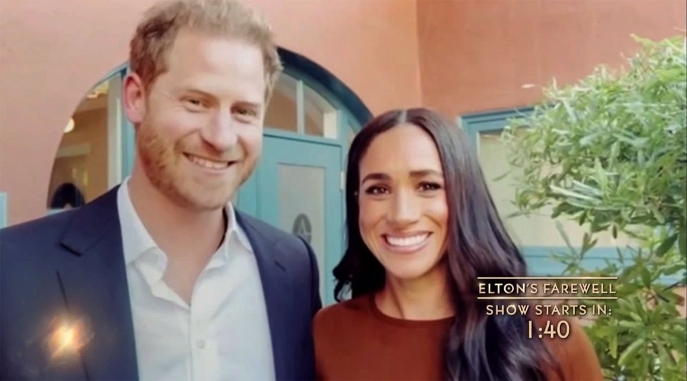 Prince Harry and Meghan Markle Get Affectionate in Sweet Tribute to Elton John at Farewell Tour 3