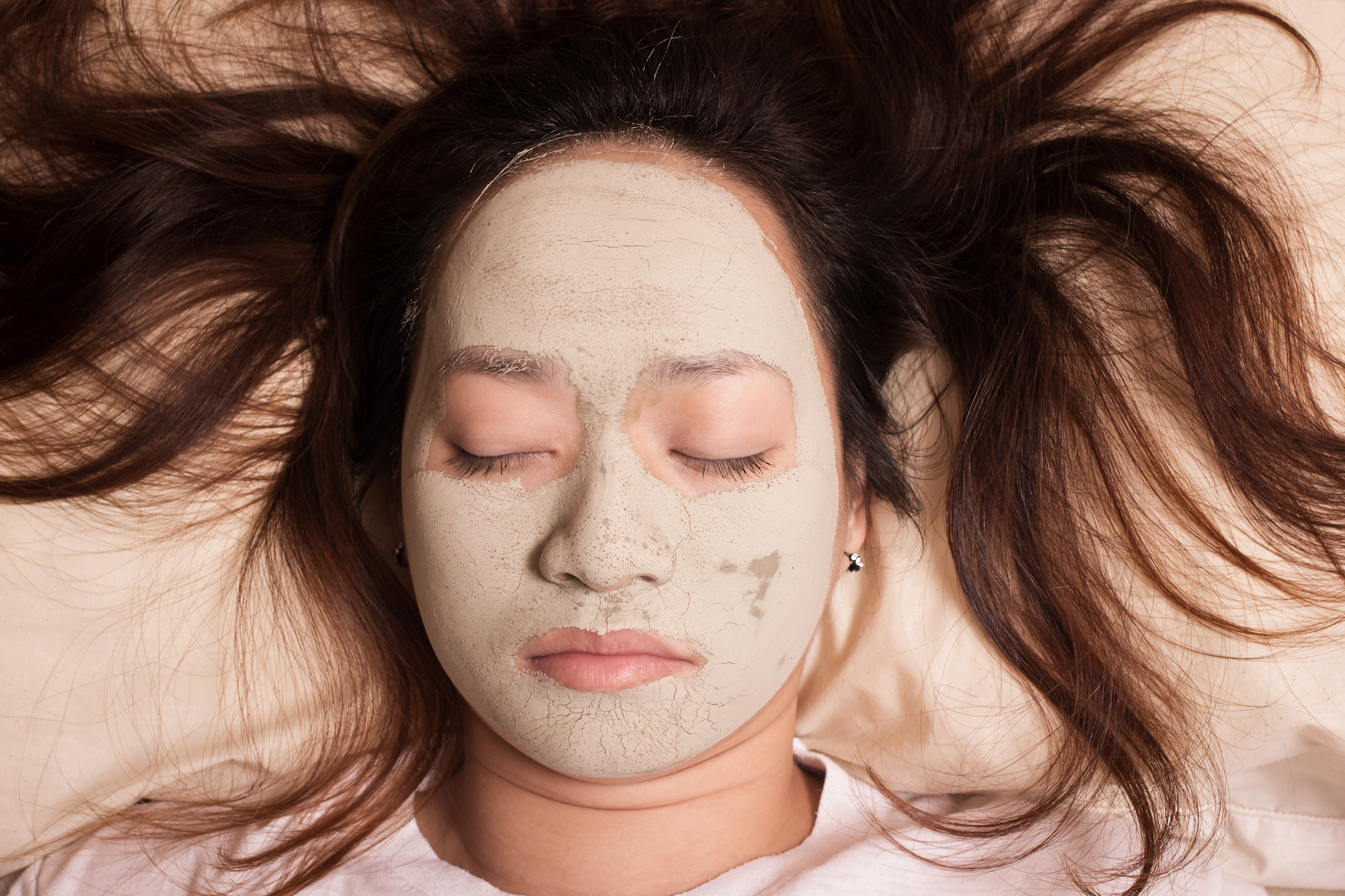 Face-Mask-In-Bed-Stock-Photo