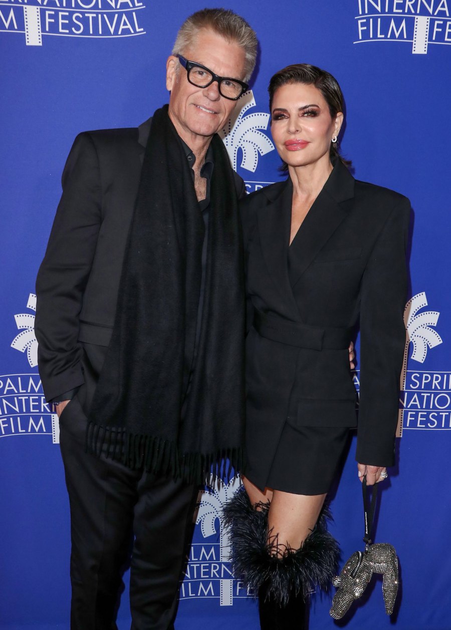 RHOBH's Lisa Rinna and Harry Hamlin's Relationship Timeline silver purse