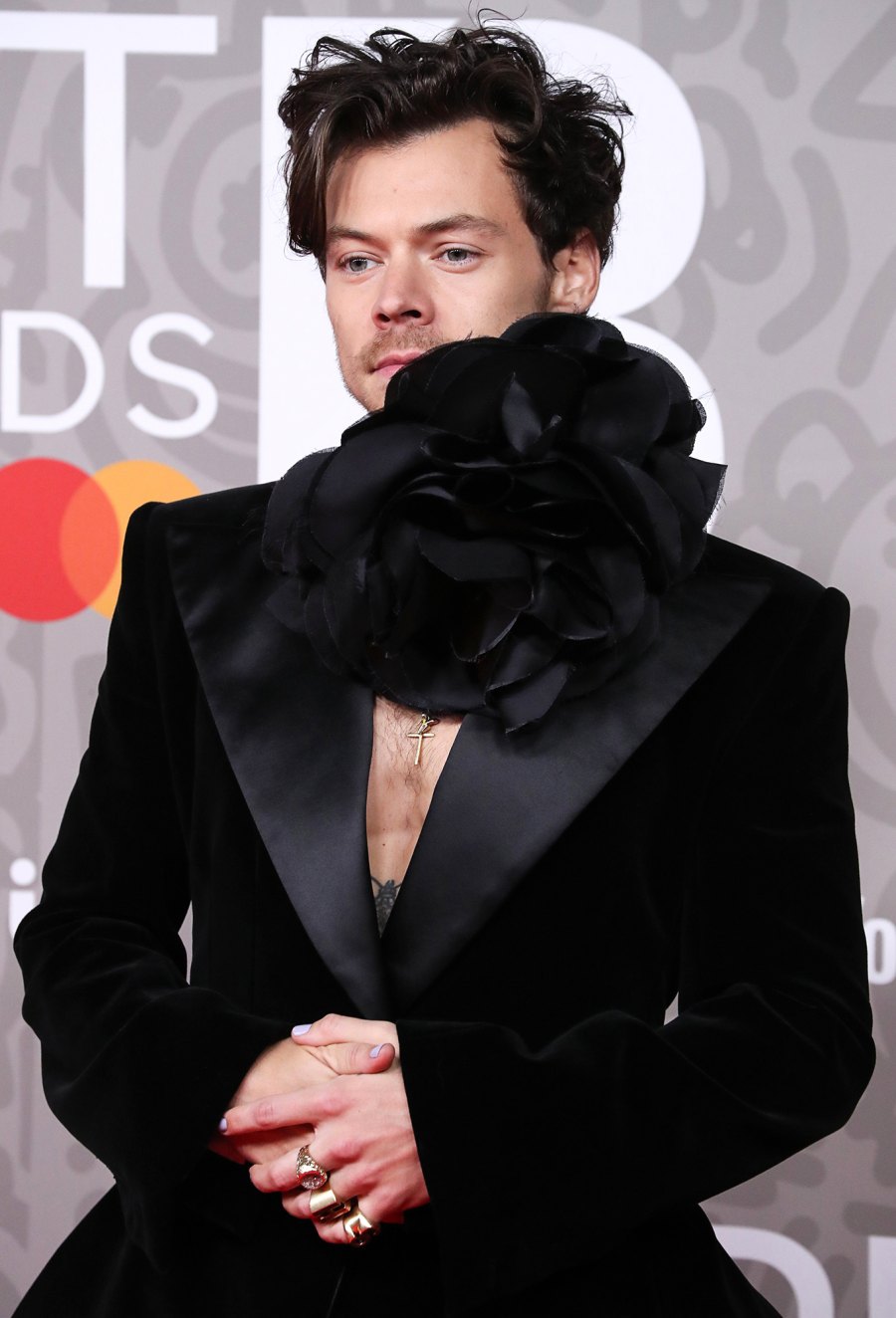 Harry Styles Wears Giant Flower Choker on 2023 Brit Awards Red Carpet: See Photos