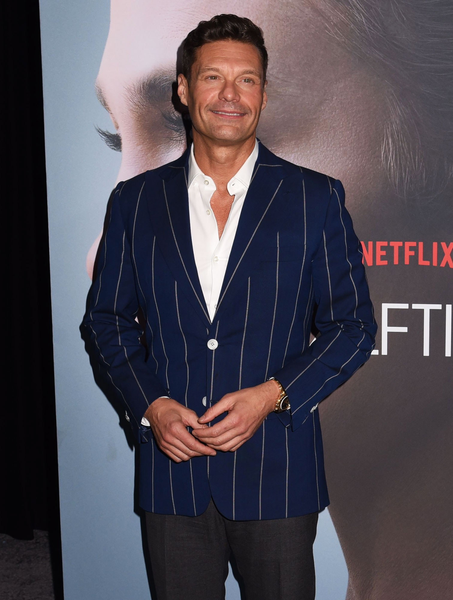 Ryan Seacrest Through the Years striped suit