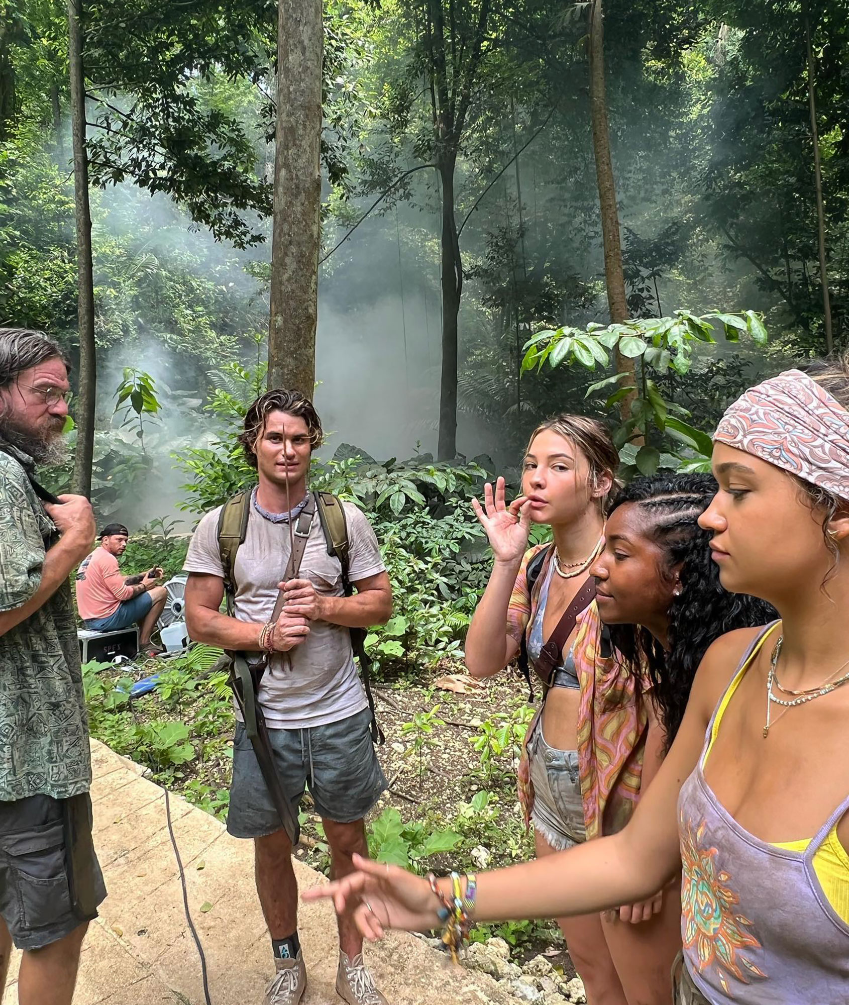 Tomfoolery Experts! ‘Outer Banks’ Cast’s Best Behind-the-Scenes Moments purple tank
