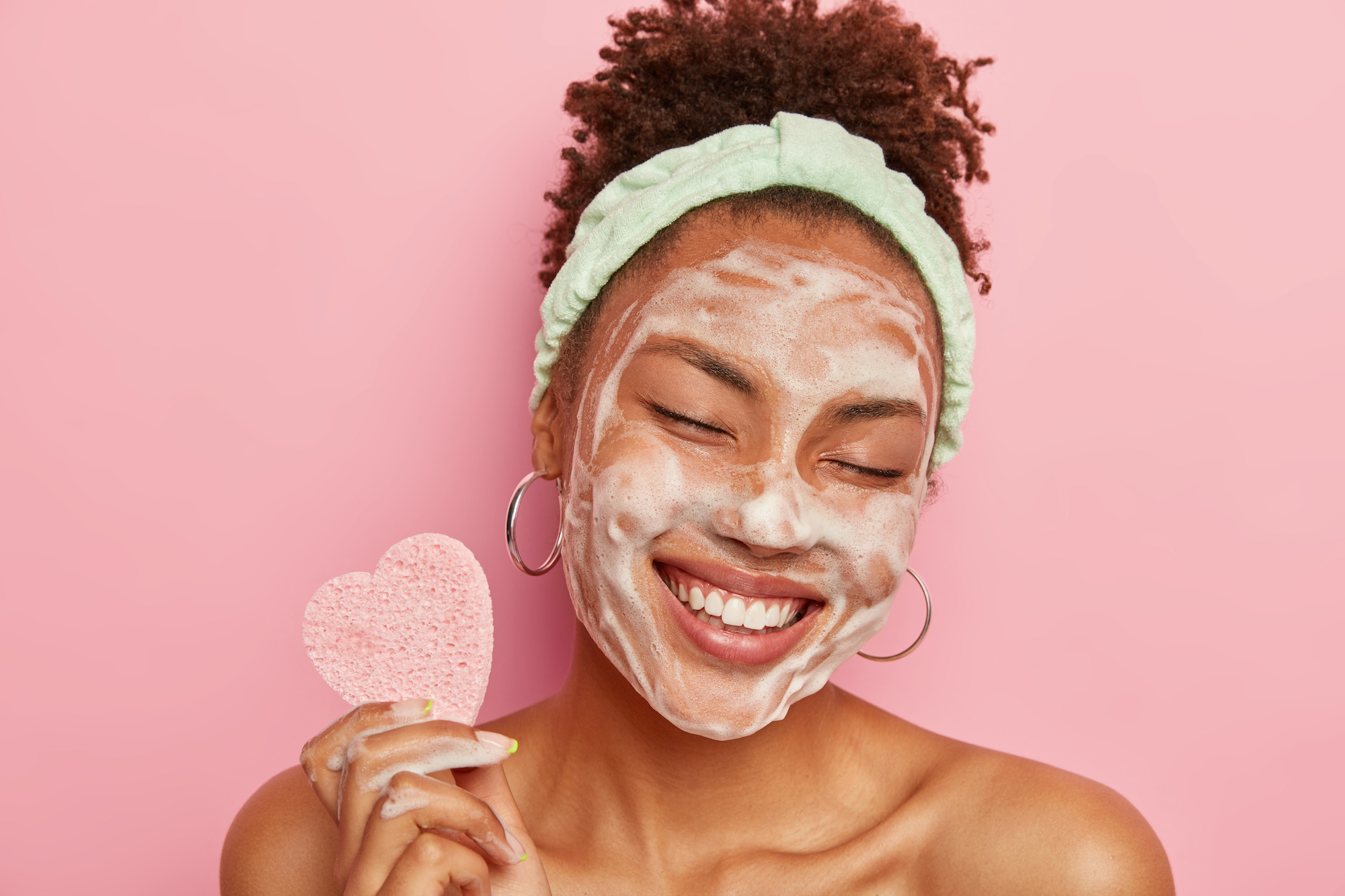 Woman-With-Foaming-Face-Wash-Stock-Photo