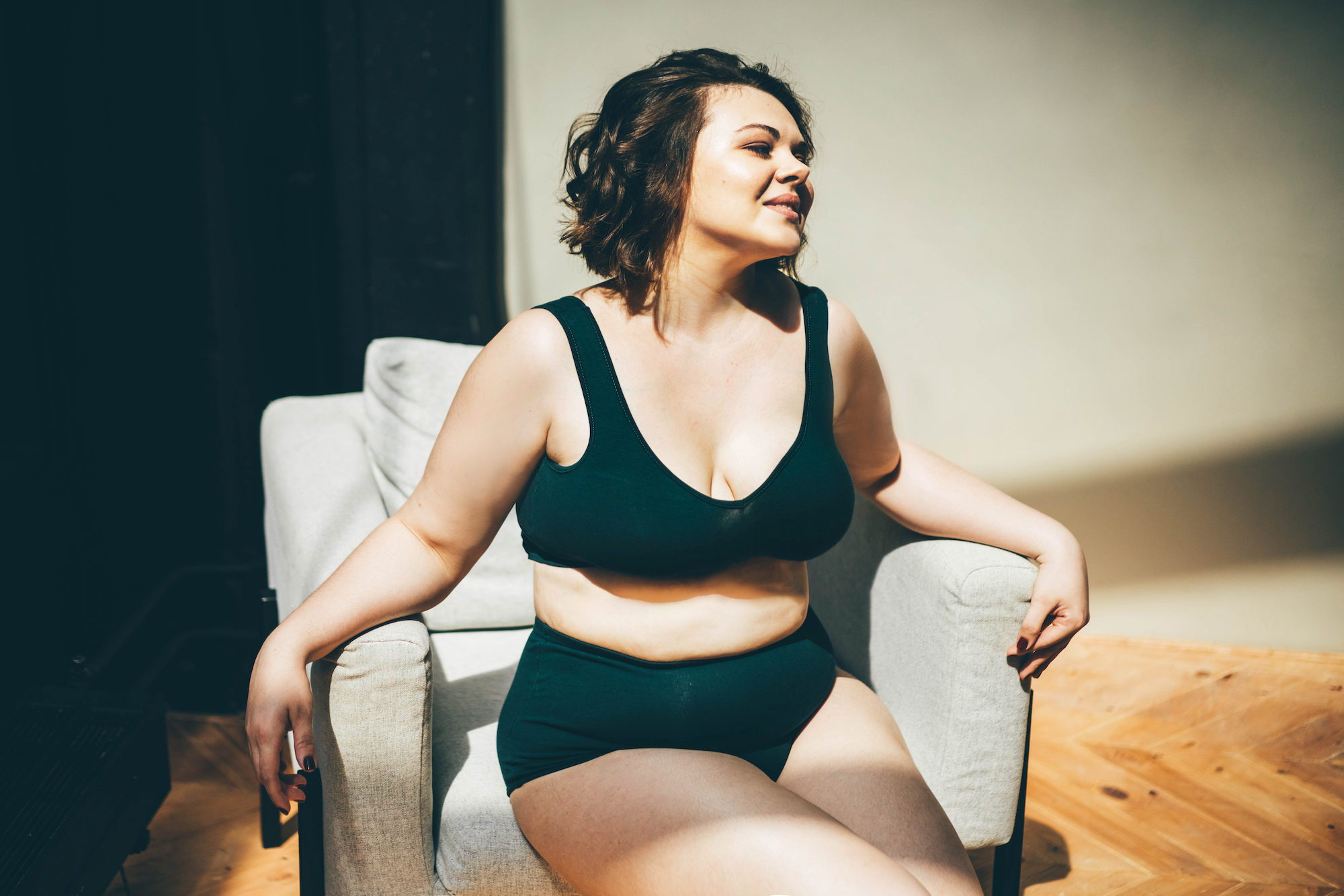Plus-Size-Woman-Wearing-Lounge-Bra-Stock-Photo