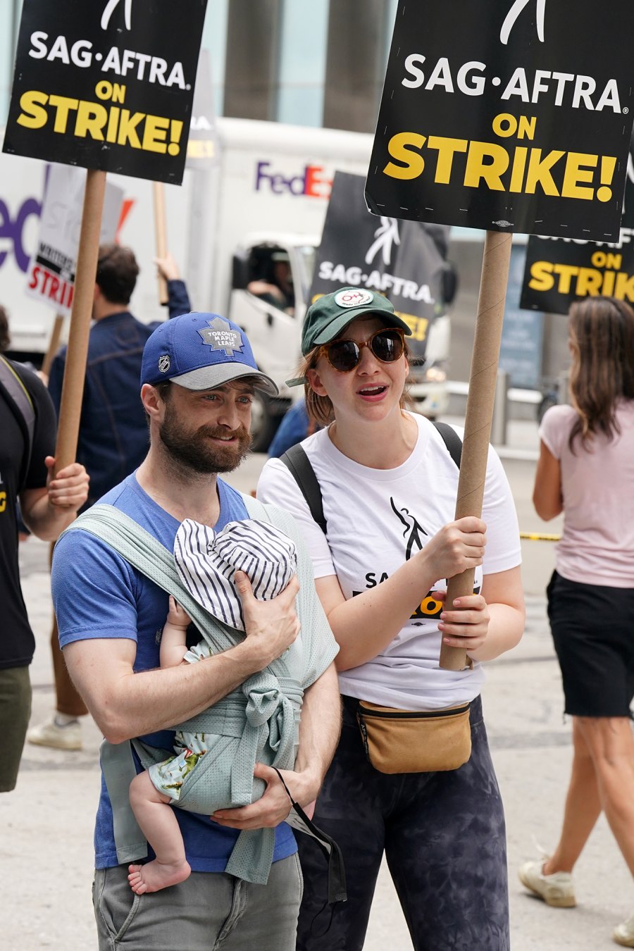 Daniel Radcliffe and Girlfriend Erin Darke Carry Baby Boy to Picket Line During SAG-AFTRA Strike