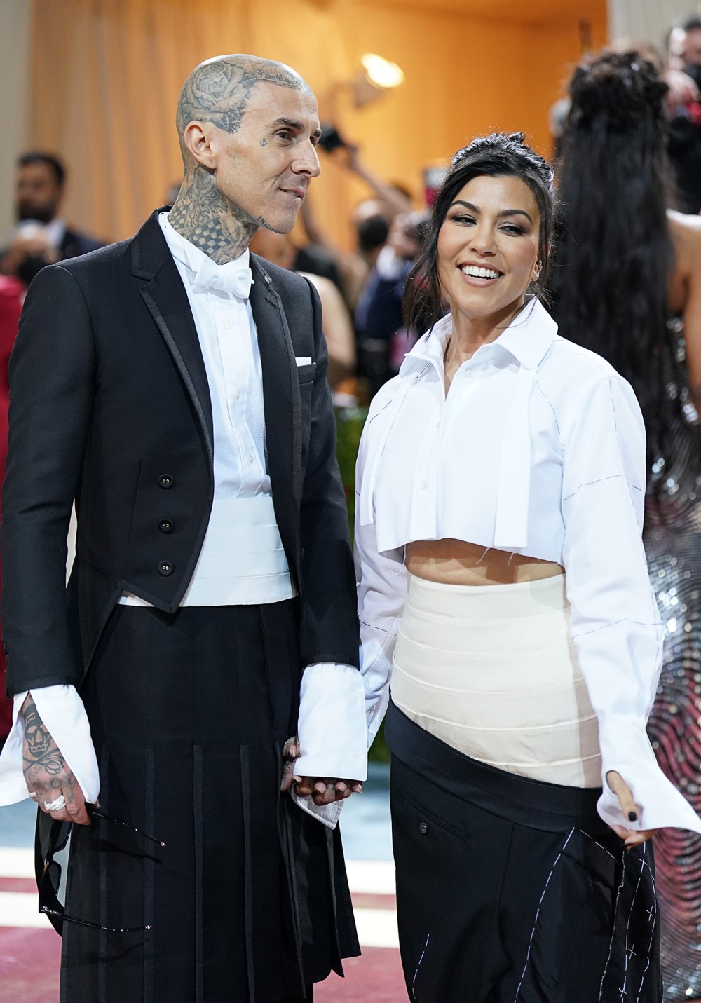 Pregnant Kourtney Kardashian Shows Off Baby Bump During Denver Outing With Travis Barker