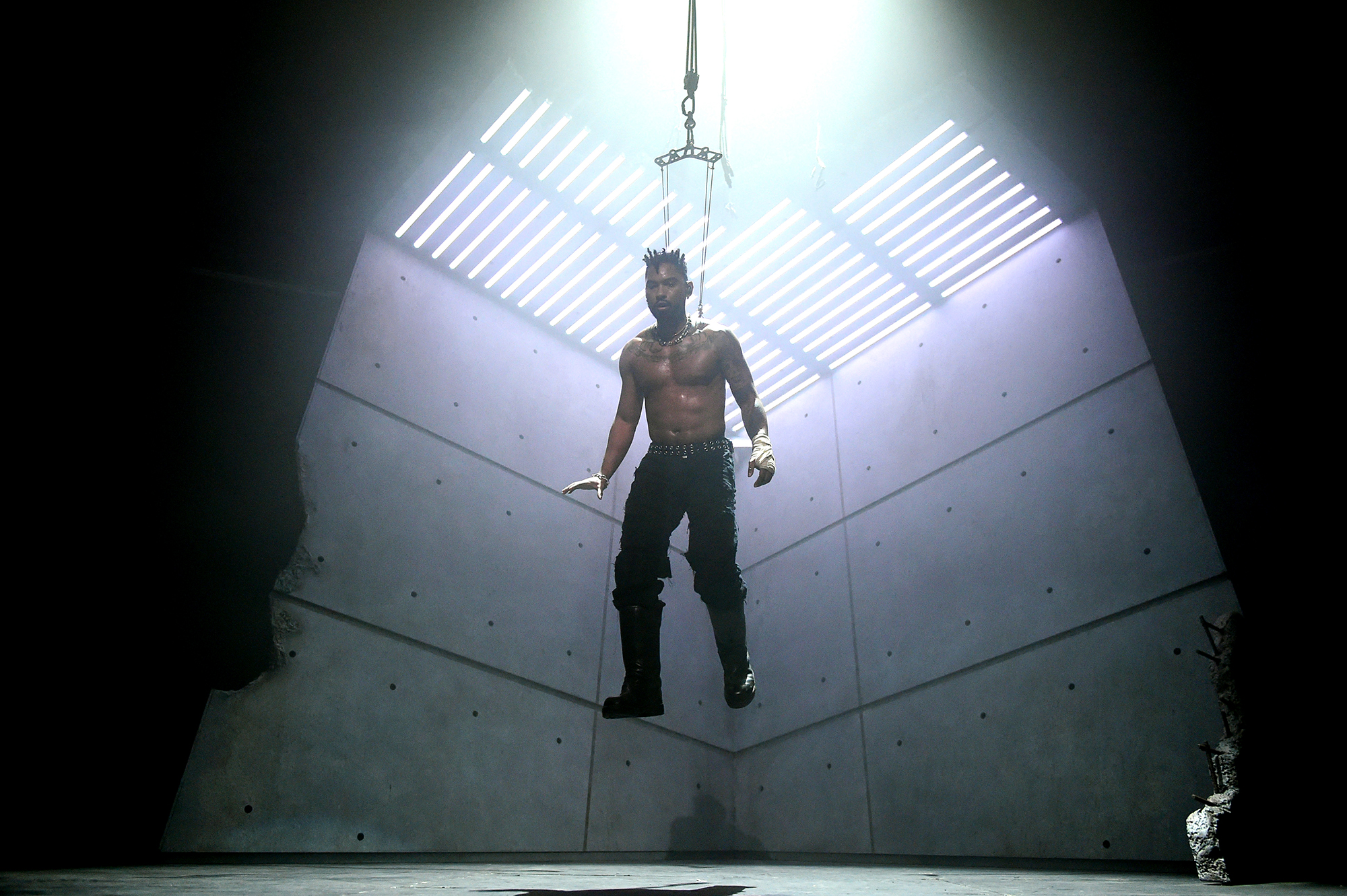 Singer Miguel Got His Back Pierced to Be Suspended By Hooks During Performance: Photos