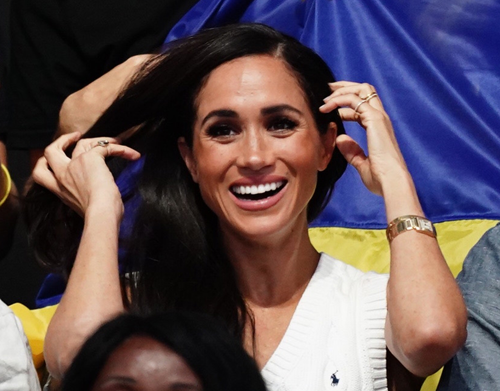 meghan-markle-white-sweater-vest