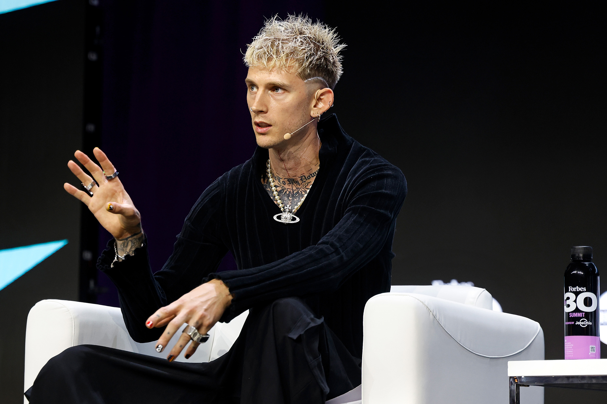 Machine Gun Kelly Apologizes For ‘Primal’ Reaction After a Fan Storms the Stage: 'Get the F--k Away'