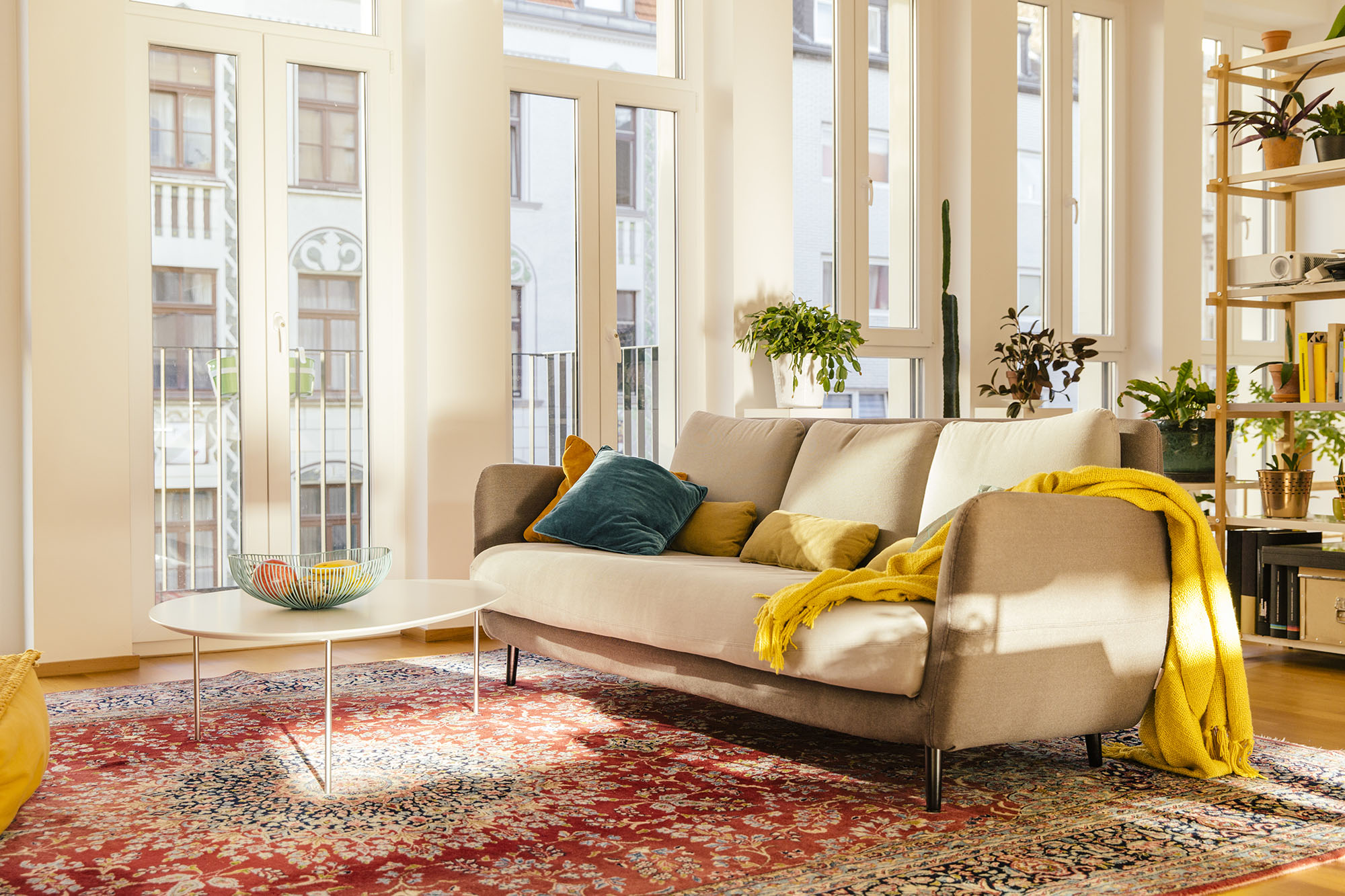 Living room area with Persian rug in loft apartment of Cologne, NRW, Germany