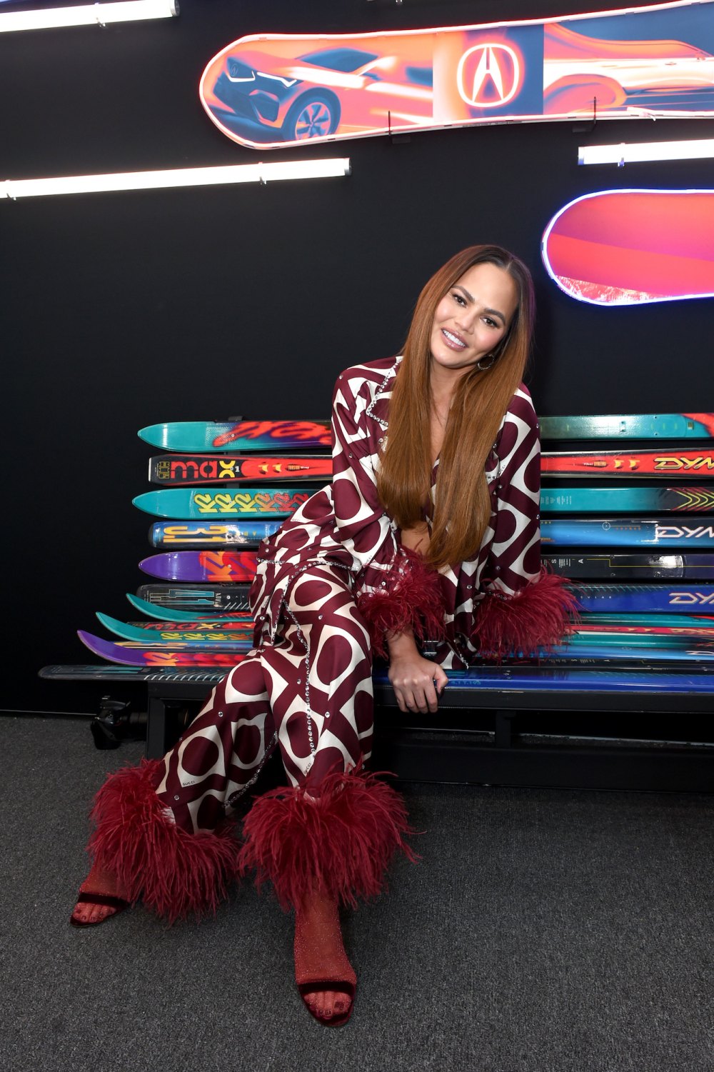 Chrissy Teigen Pairs Embellished Gucci Pajamas With Heels at Sundance Film Festival