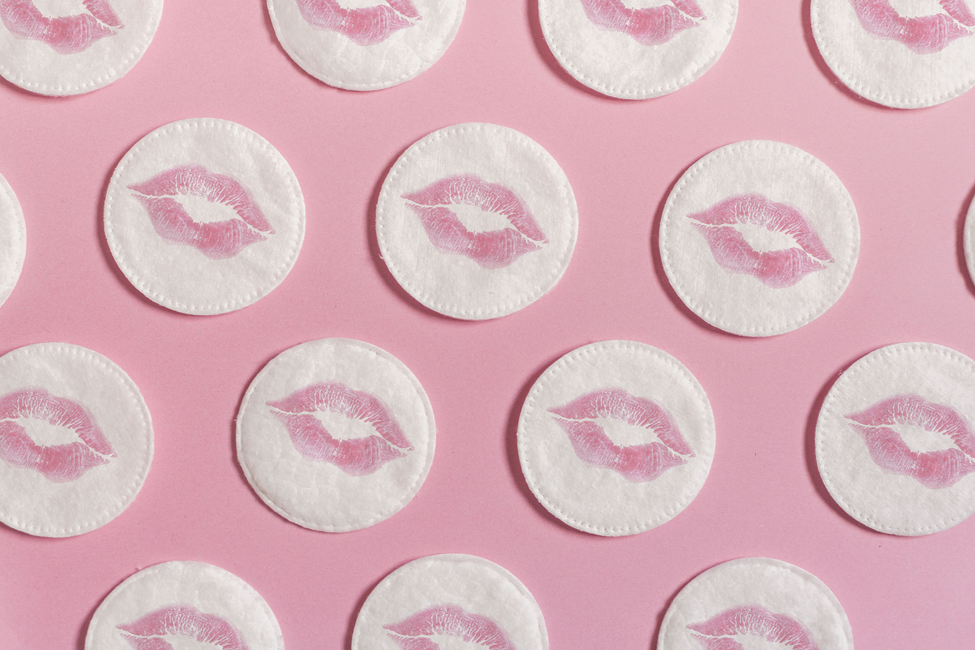 The cottons have marked lips. Concept of femininity, beauty, body care...