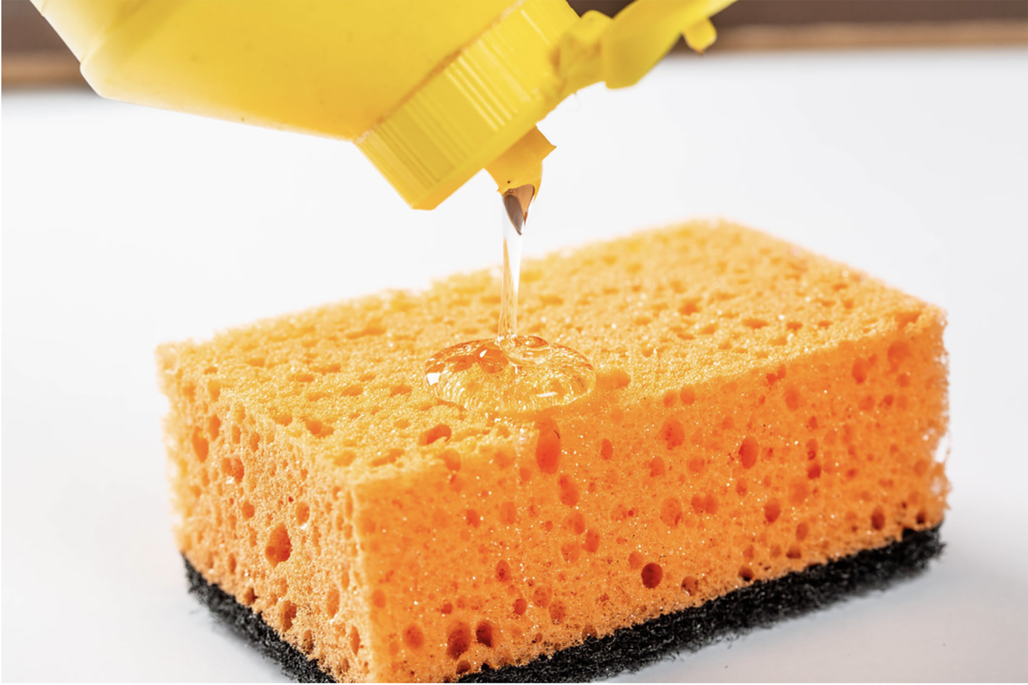 Dishwashing detergent and a sponge
