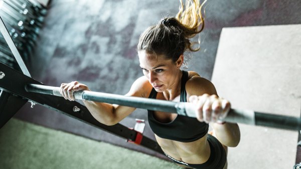 Woman exercising with chin-ups