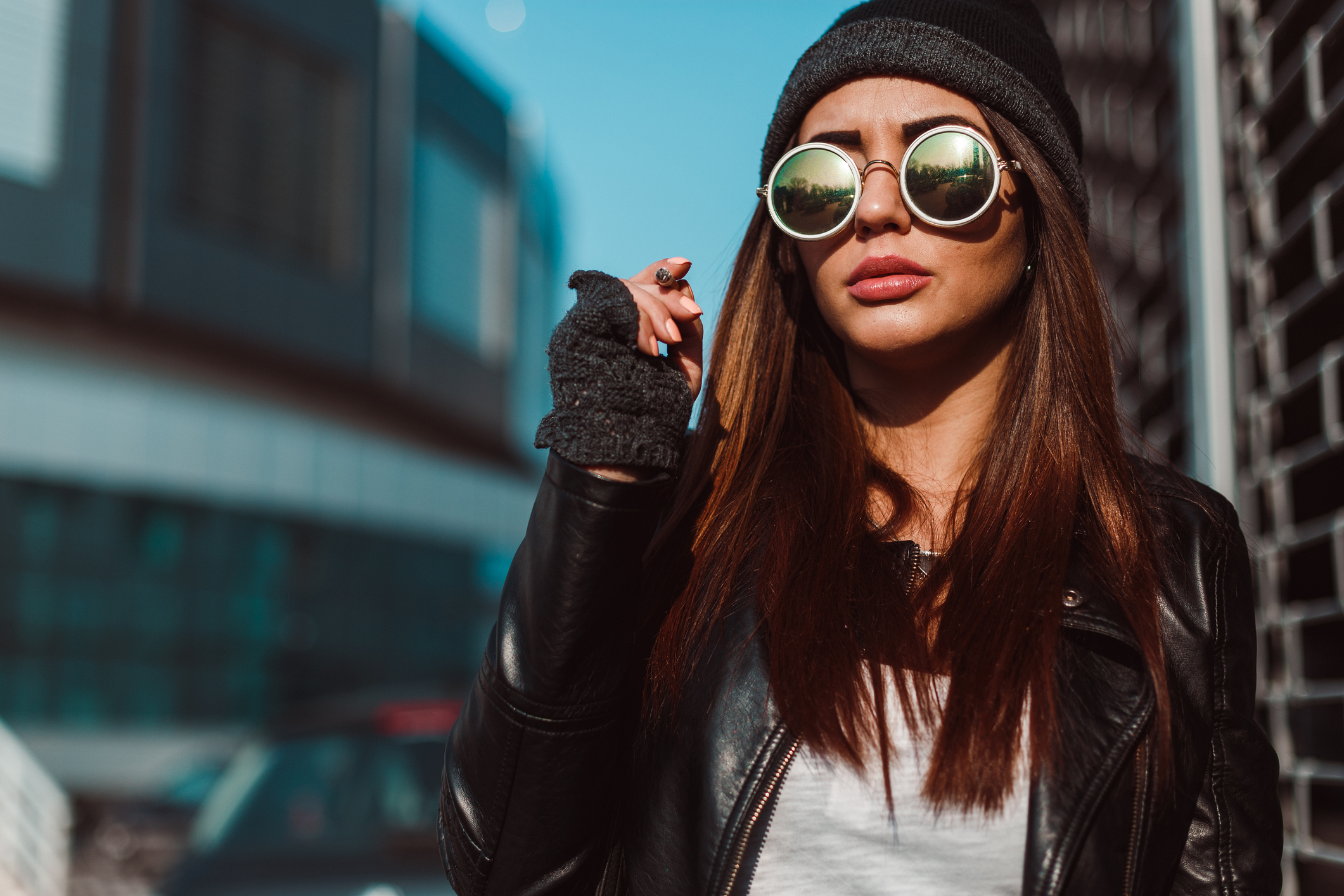 15 Chic Dark Sunglasses That Actually Block Out the Sun