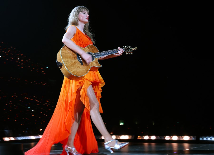 Taylor Swift Debuts Orange Surprise Song Dress During 3rd Paris Show