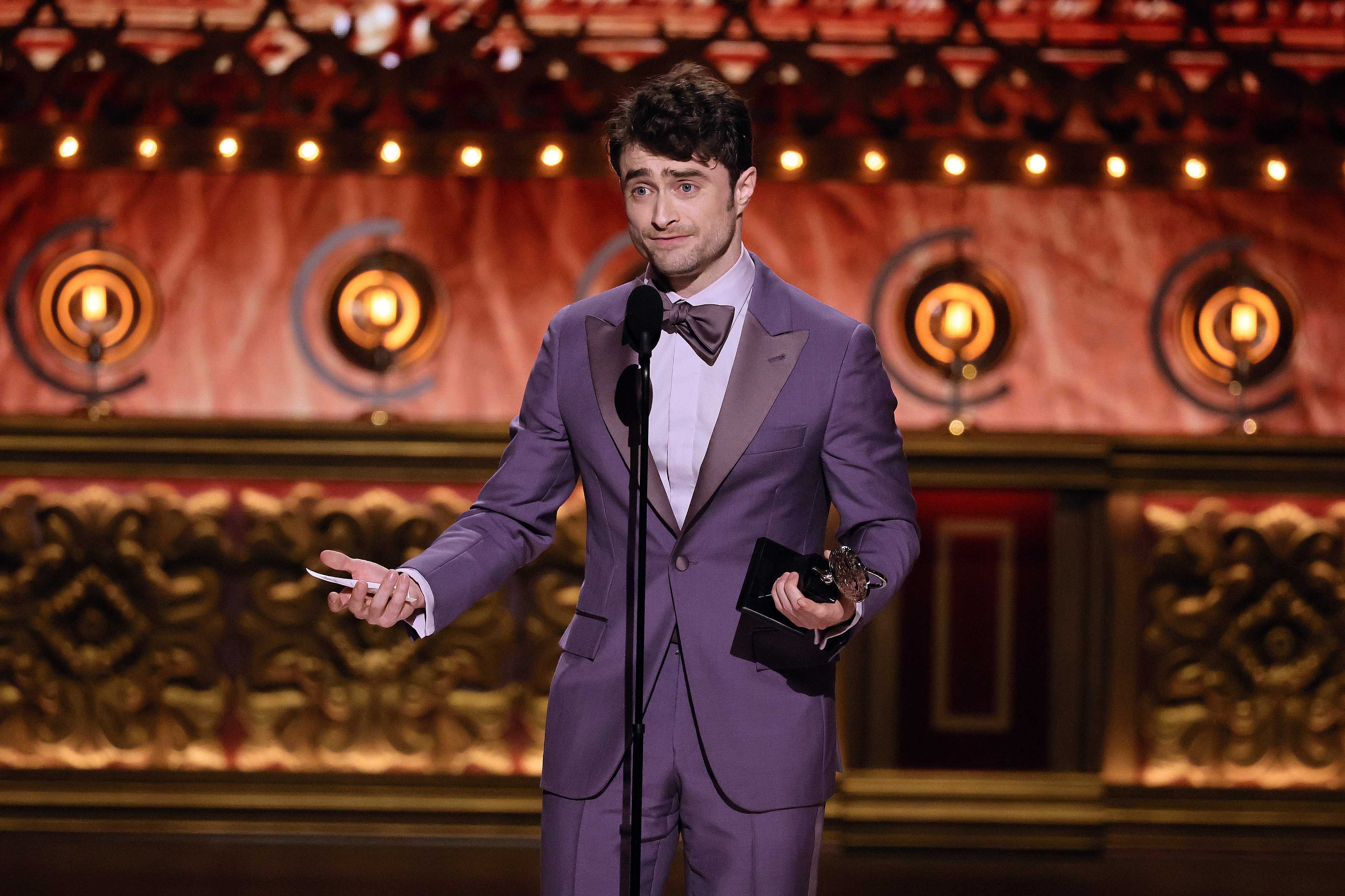 NEW YORK, NEW YORK - JUNE 16: Daniel Radcliffe accepts the Best Performance by an Actor in a Featured Role in a Musical award for "Merrily We Roll Along" onstage during The 77th Annual Tony Awards at David H. Koch Theater at Lincoln Center on June 16, 2024 in New York City. (Photo by Theo Wargo/Getty Images for Tony Awards Productions)