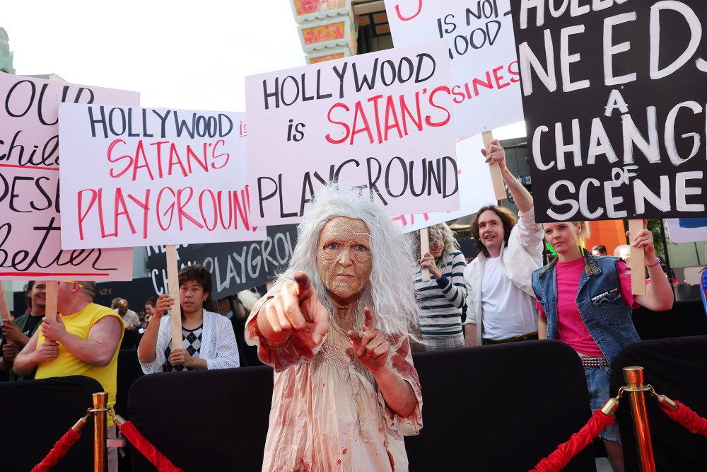 Feature Protestors From MaXXXine Crash the LA Premiere Red Carpet