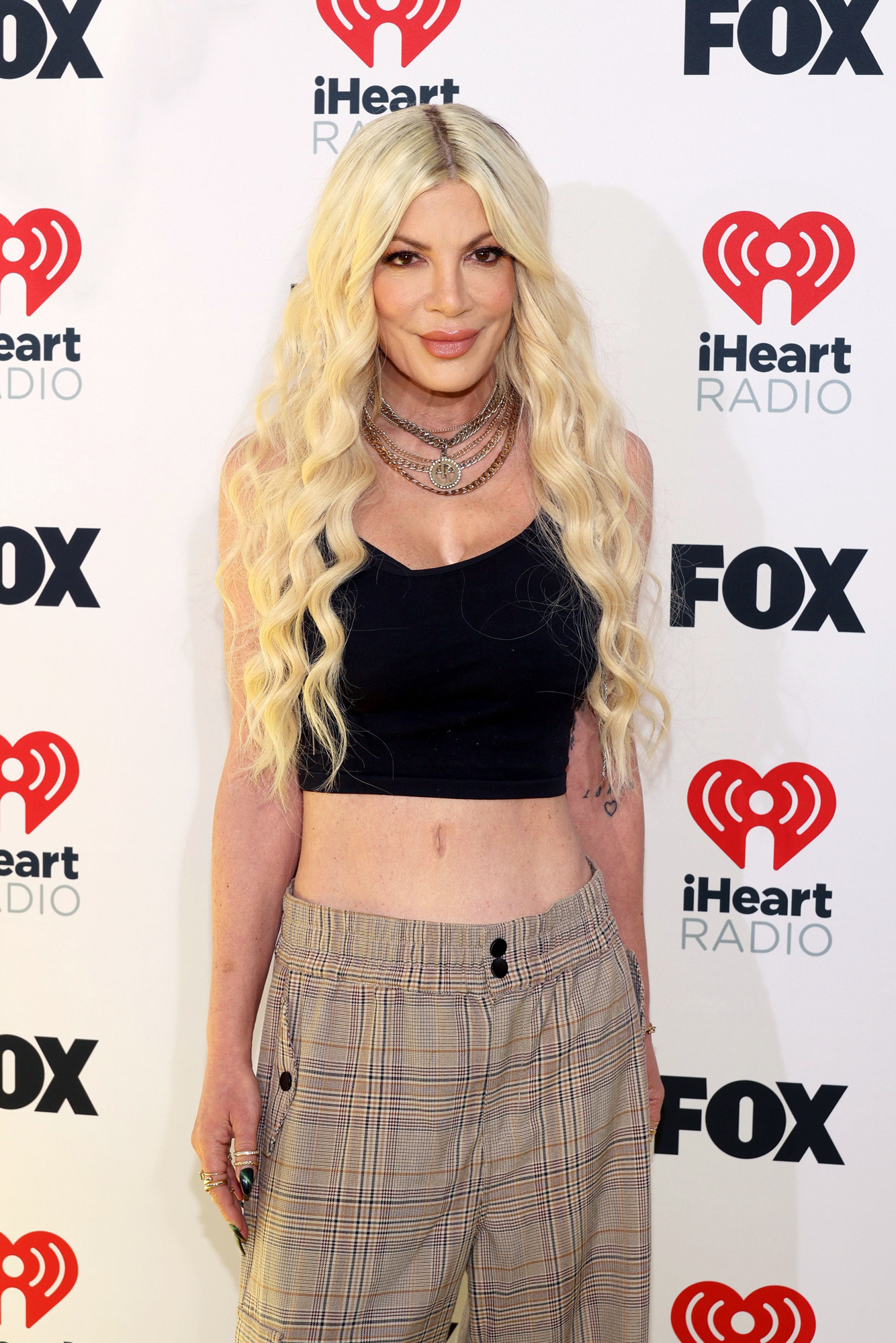 Tori Spelling Teases a 3rd Boob Job