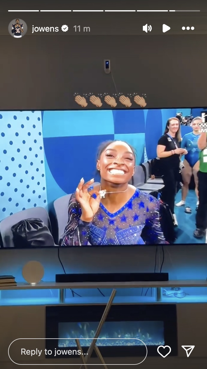 Jonathan Owens watches Simone Biles compete