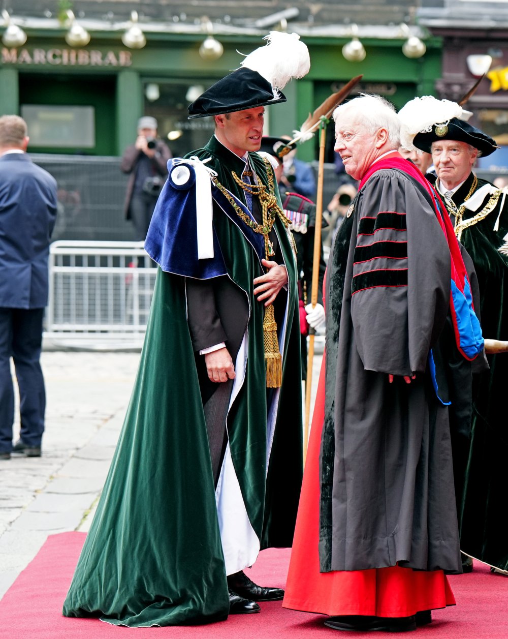 The Historical Meaning Behind Prince William Massive Ostrich Feather Hat and Ornate Velvet Robe