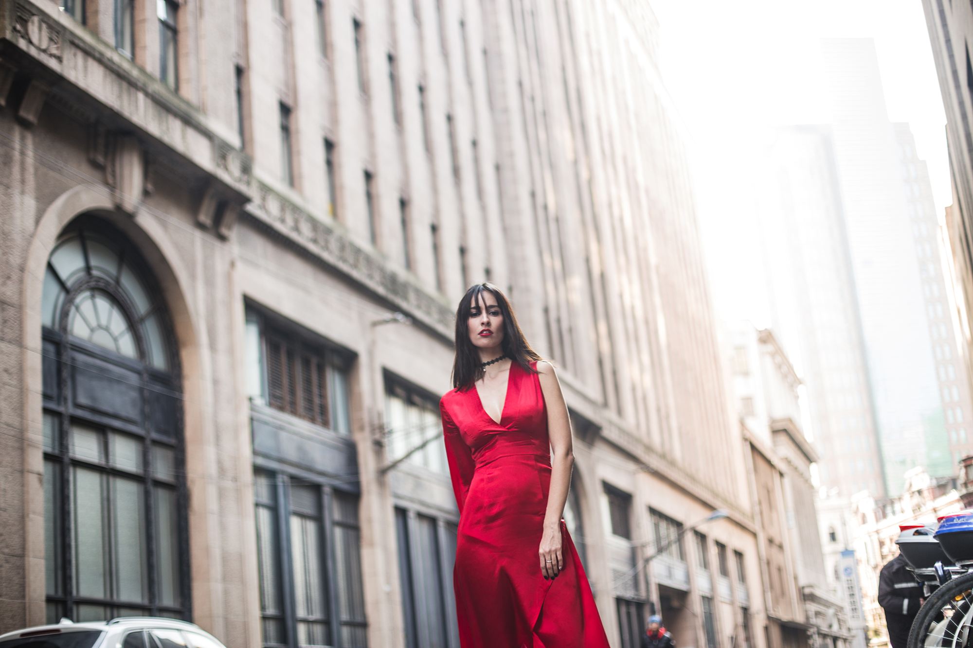 Beautiful woman walking down the city street