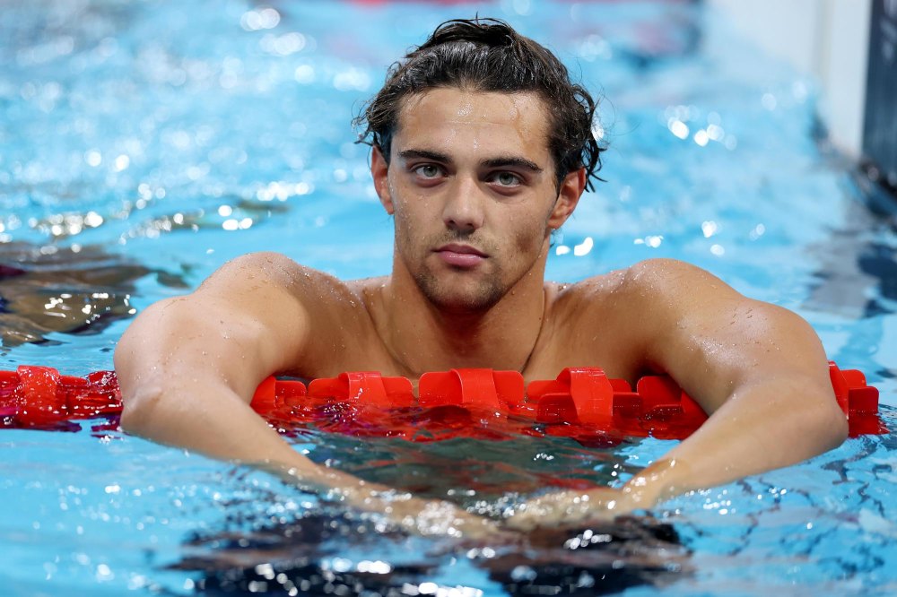 Swimmer Thomas Ceccon seen sleeping outside after remarks about Olympic Villages lack of AC