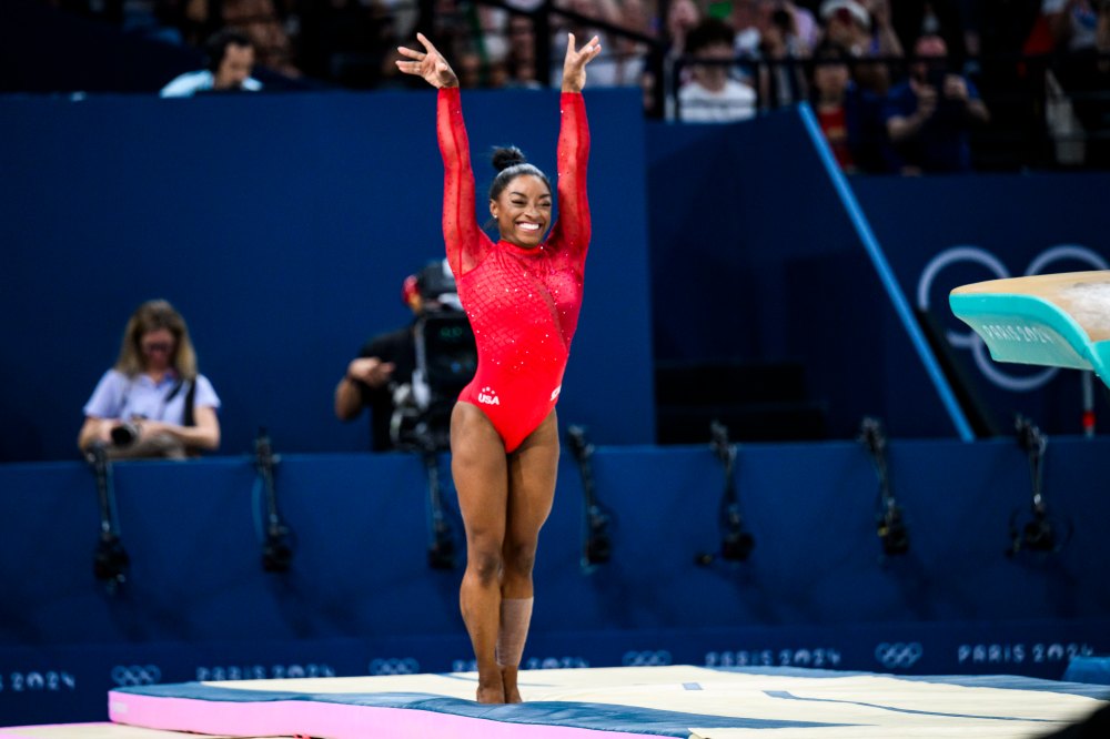 PARIS, FRANCE - AUGUST 3: Simone Biles of Team United States celebrates after finishing her routine during the Artistic Gymnastics Women's Vault Final on day eight of the Olympic Games Paris 2024 at the Bercy Arena on August 3, 2024 in Paris, France. (Photo by Tom Weller/VOIGT/GettyImages)