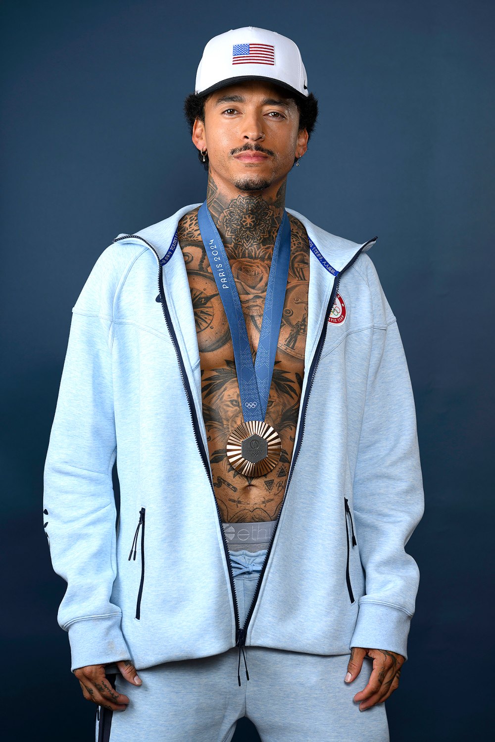 Skateboarder Nyjah Huston’s Performance at the 2024 Paris Olympics Has Us Googling Him Shirtless