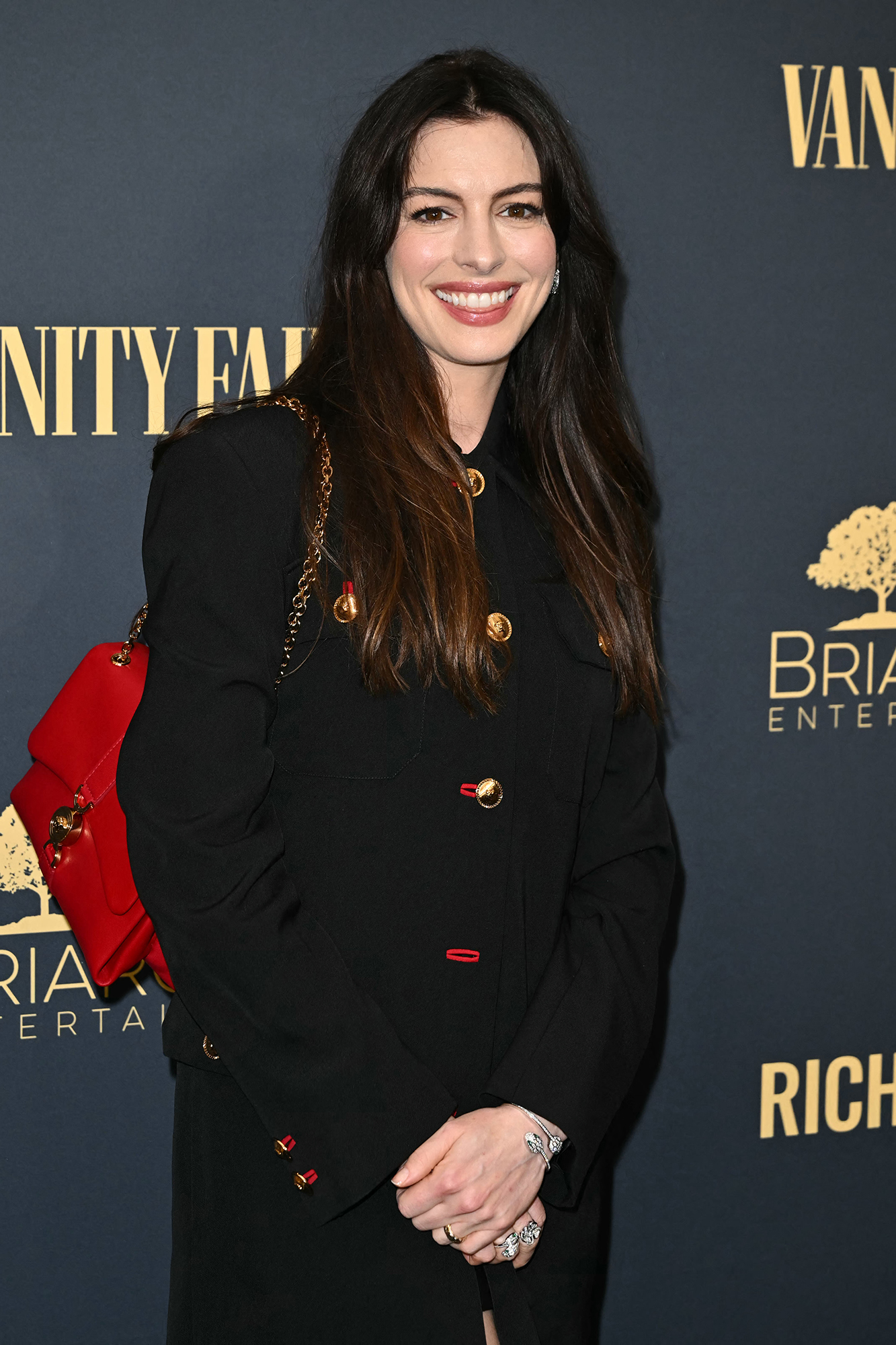 Anne Hathaway's Fall Coat Is Far Too Chic for Coat Check