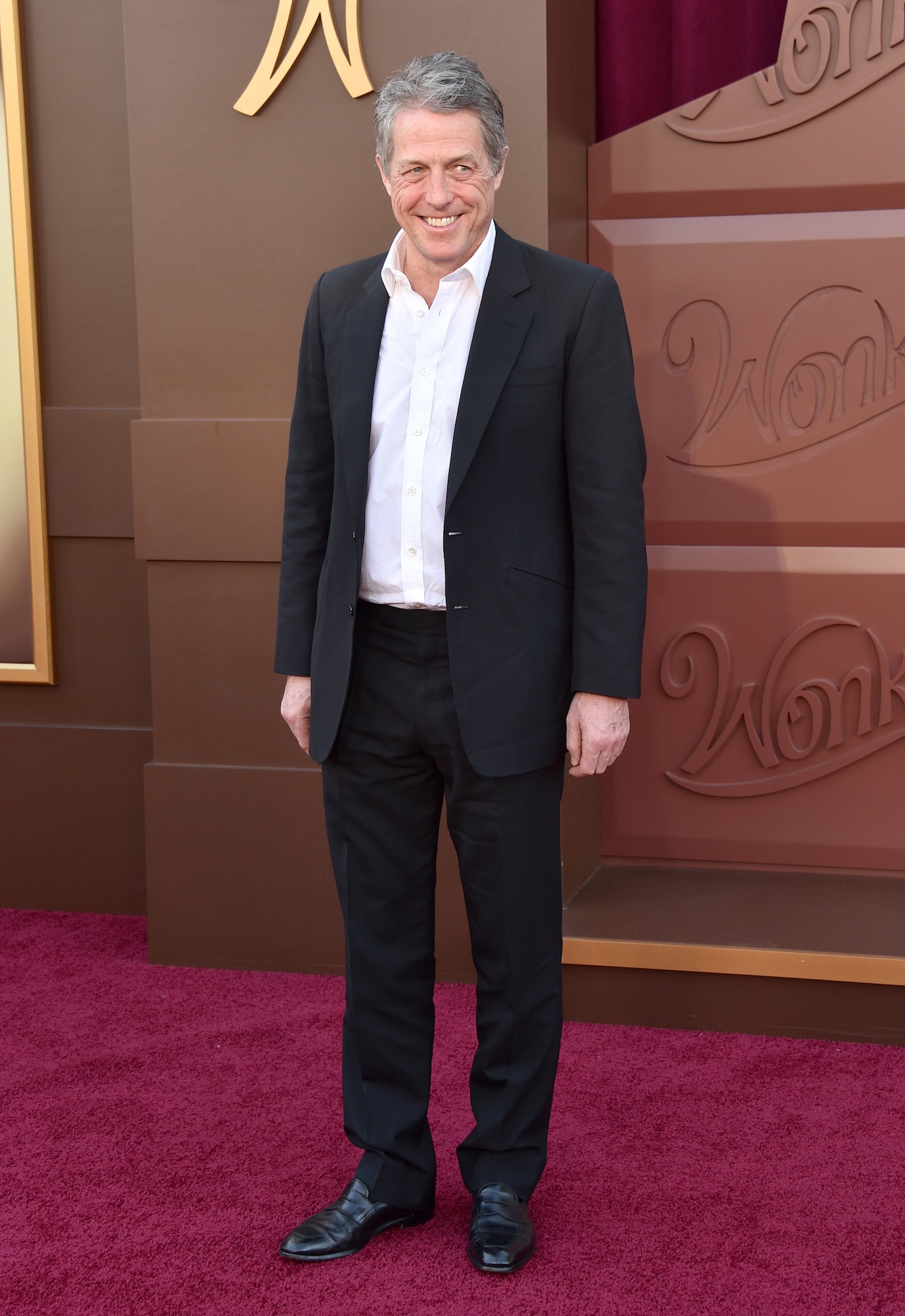 Hugh Grant Got ‘Smashed’ With Travis Kelce at Taylor Swift’s ‘Eras Tour’