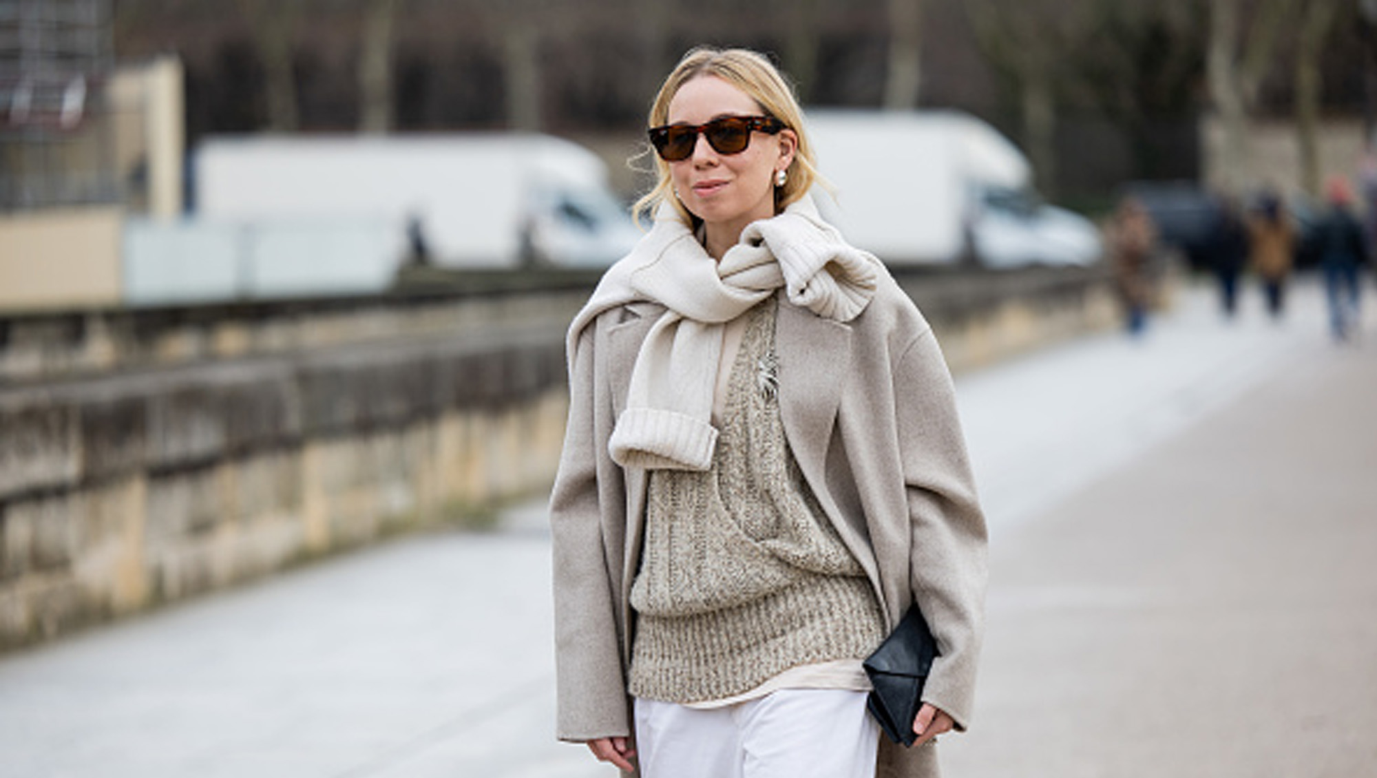 woman wearing beige sweater and coat