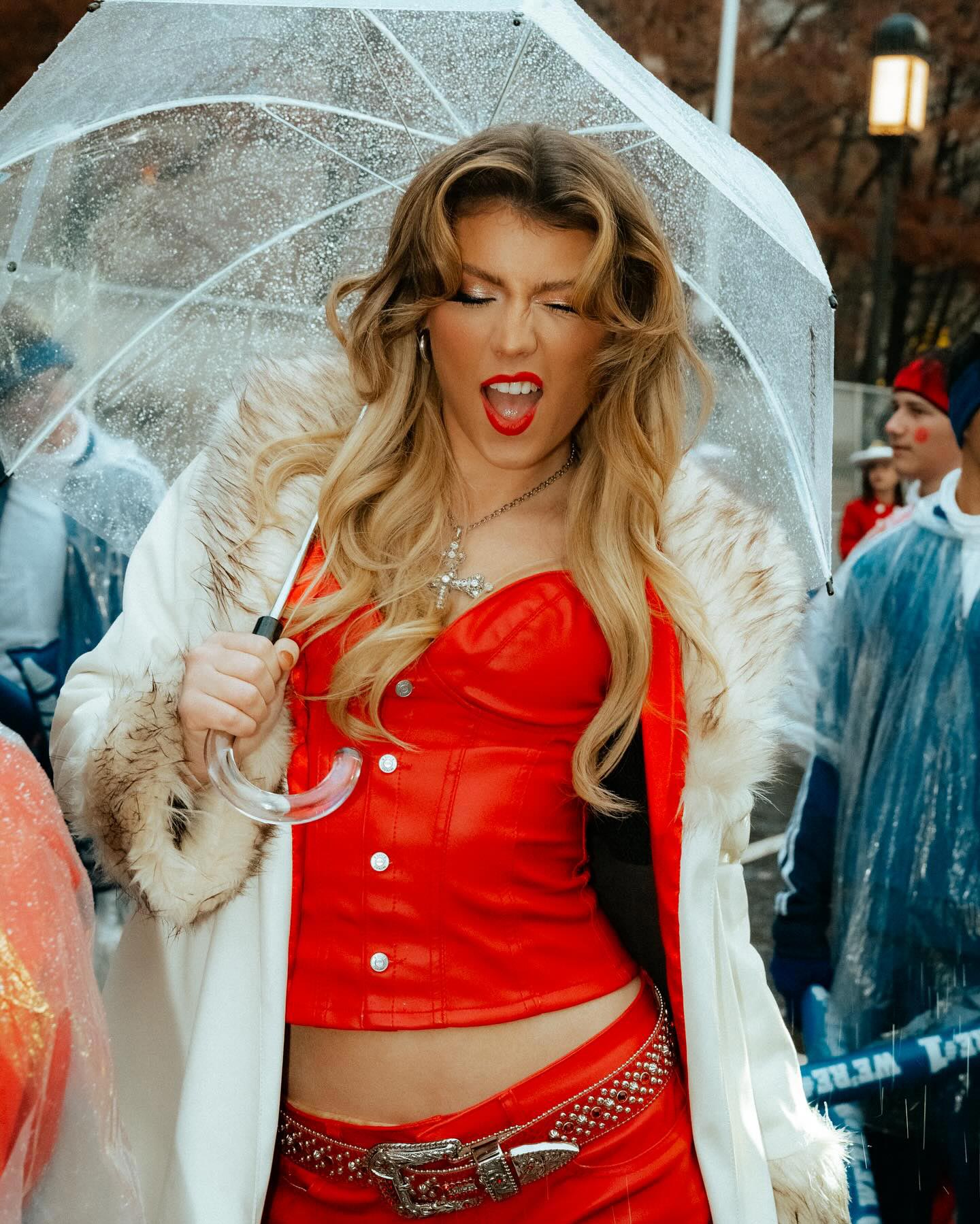 Feature Dasha Red Lipstick Smudge at Macy Day Parade