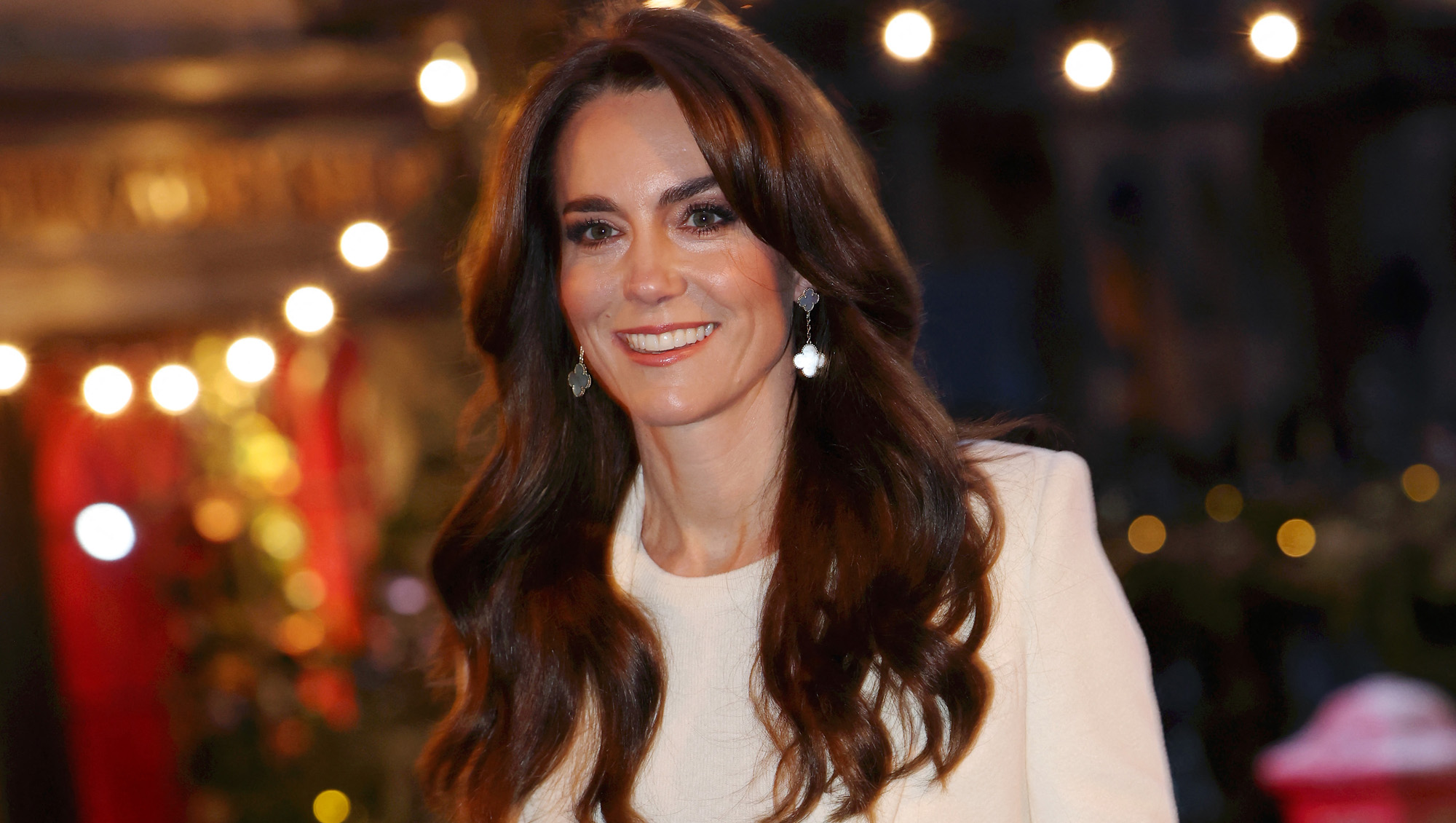 Britain's Catherine, Princess of Wales smiles as she arrives to attend the "Together At Christmas" Carol Service" at Westminster Abbey in London on December 8, 2023.