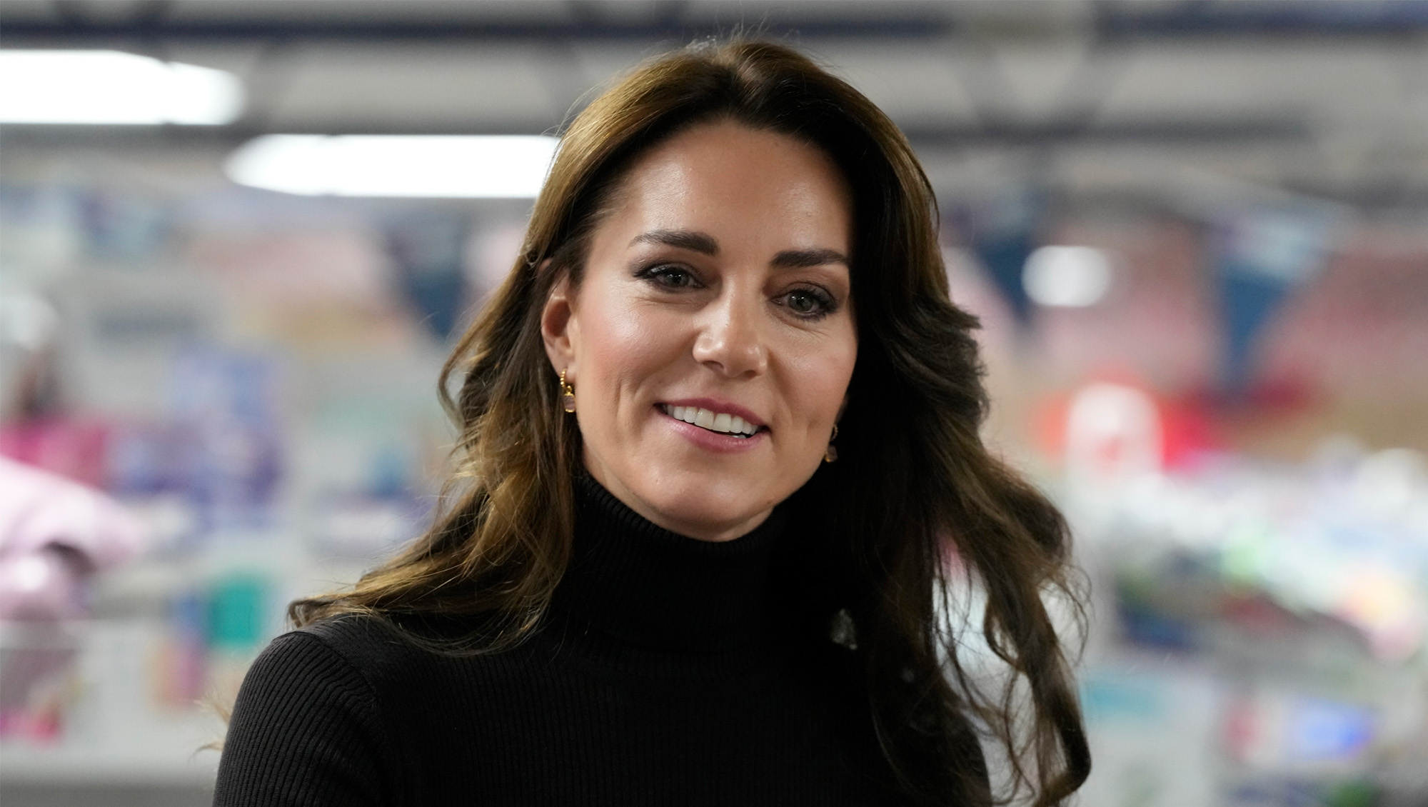 Catherine, Princess of Wales smiles during her visit to Sebby's Corner on November 24, 2023 in Barnet, England. The Royal Foundation Centre for Early Childhood are to provide support to families with young children in the run up to Christmas. Sebby's Corner was formed in January 2021 and provides items to families in need across Barnet, Hertfordshire and London.