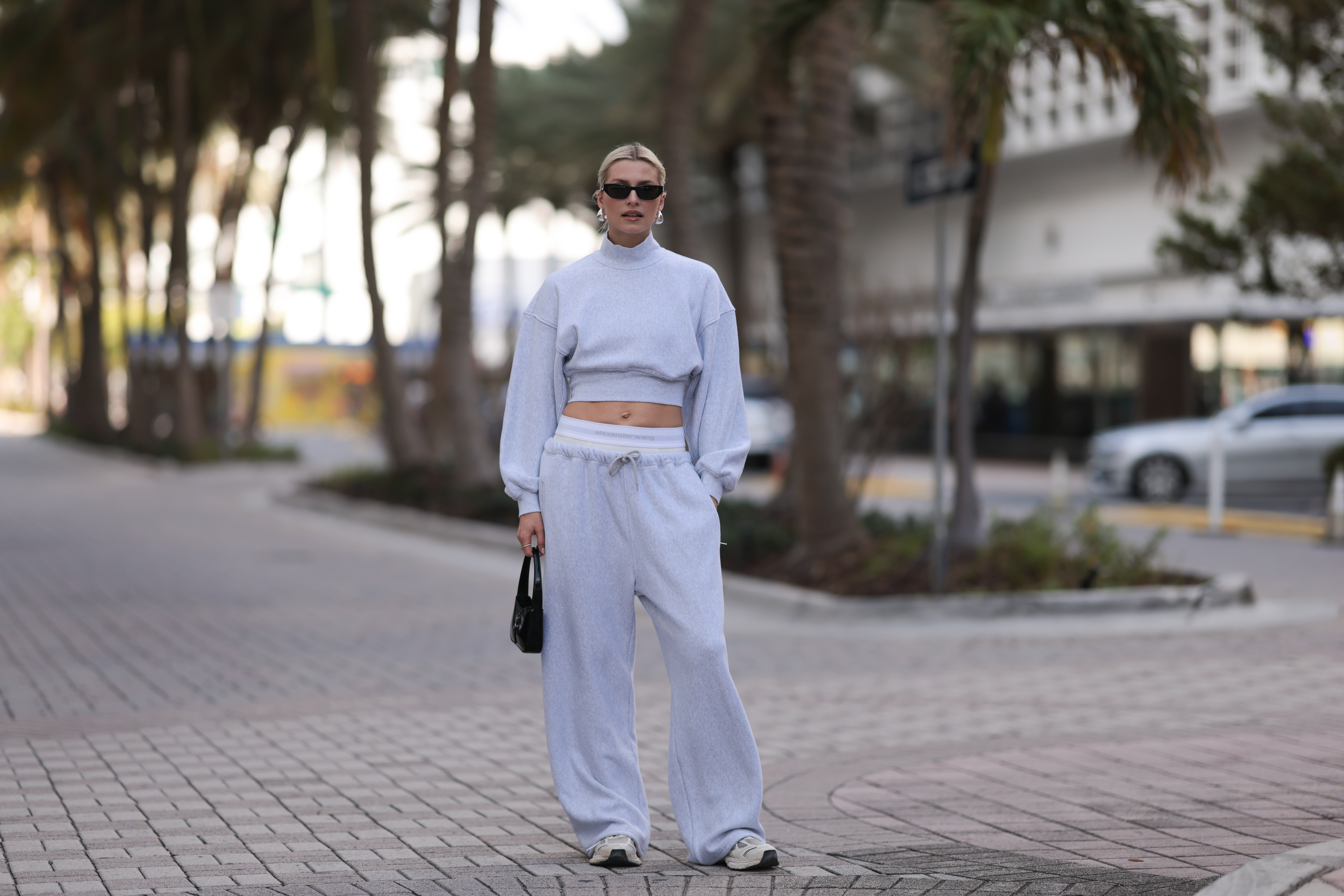 woman wearing gray heather sweatpants and sweatshirt