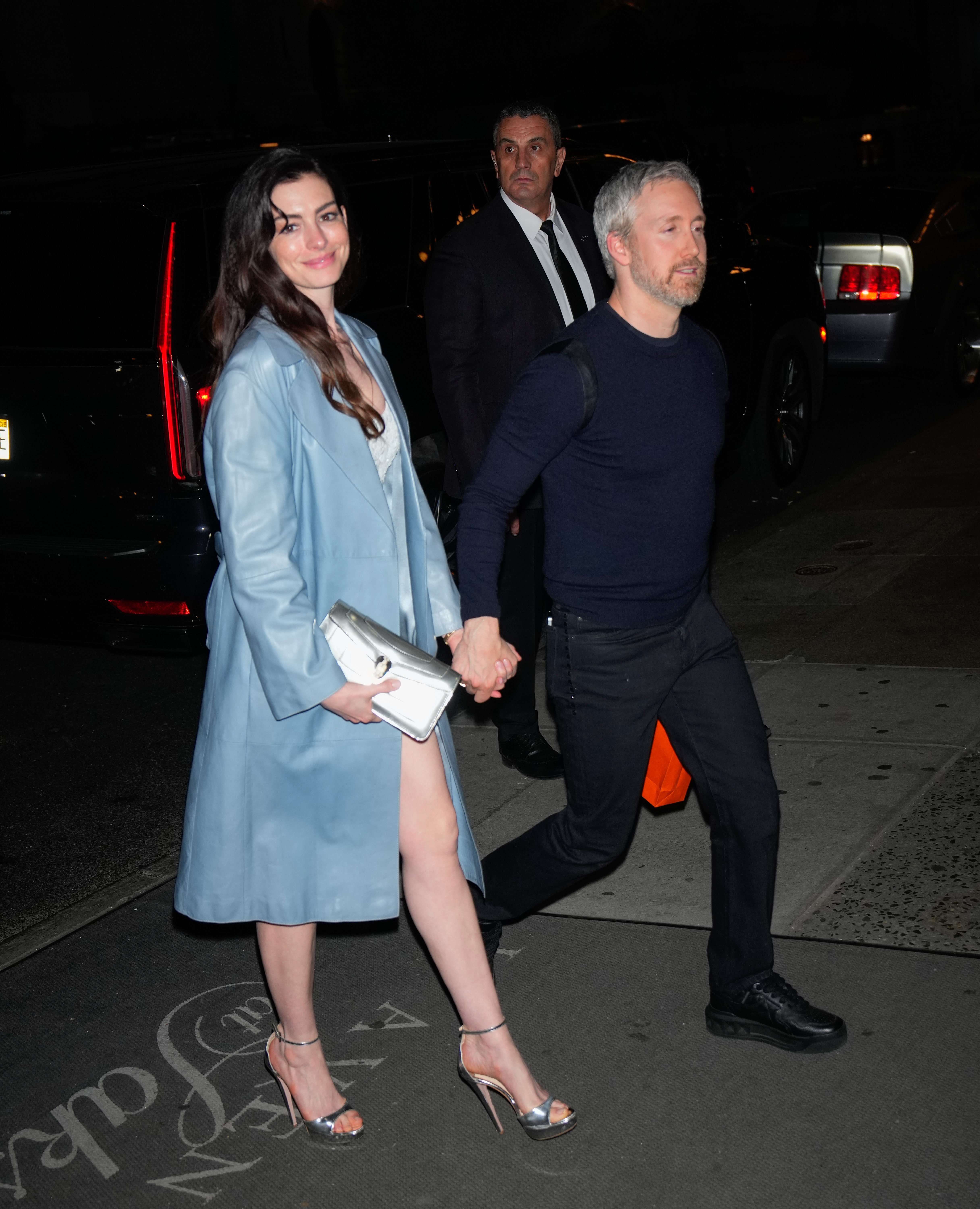 Anne Hathaway and Adam Schulman are seen arriving at Gigi Hadid's Birthday Party on April 25, 2025 in New York City.