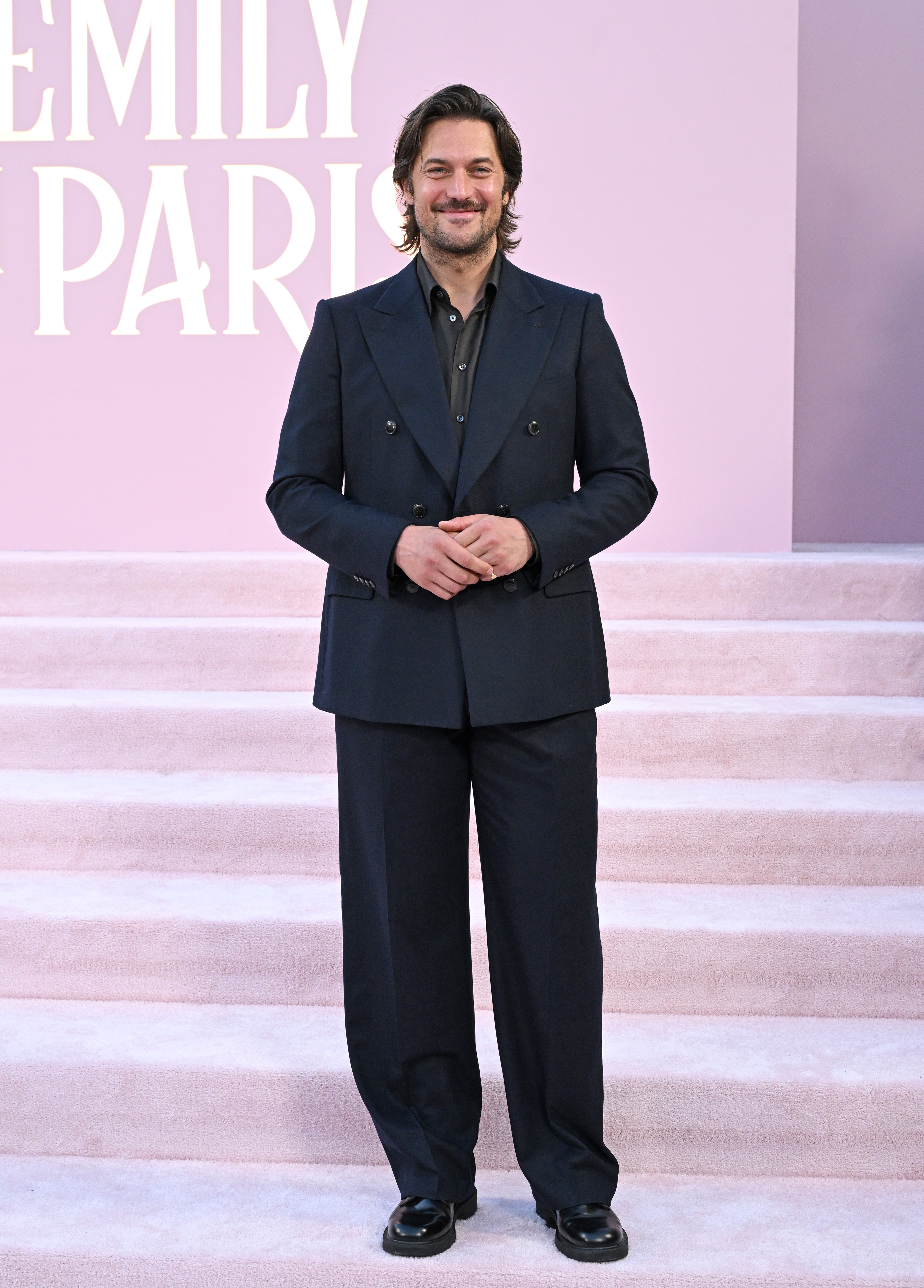 LOS ANGELES, CALIFORNIA - AUGUST 14: Lucas Bravo attends the Premiere of Netflix's "Emily in Paris" Season 4 Part 1 at The Egyptian Theatre Hollywood on August 14, 2024 in Los Angeles, California. (Photo by Axelle/Bauer-Griffin/FilmMagic)